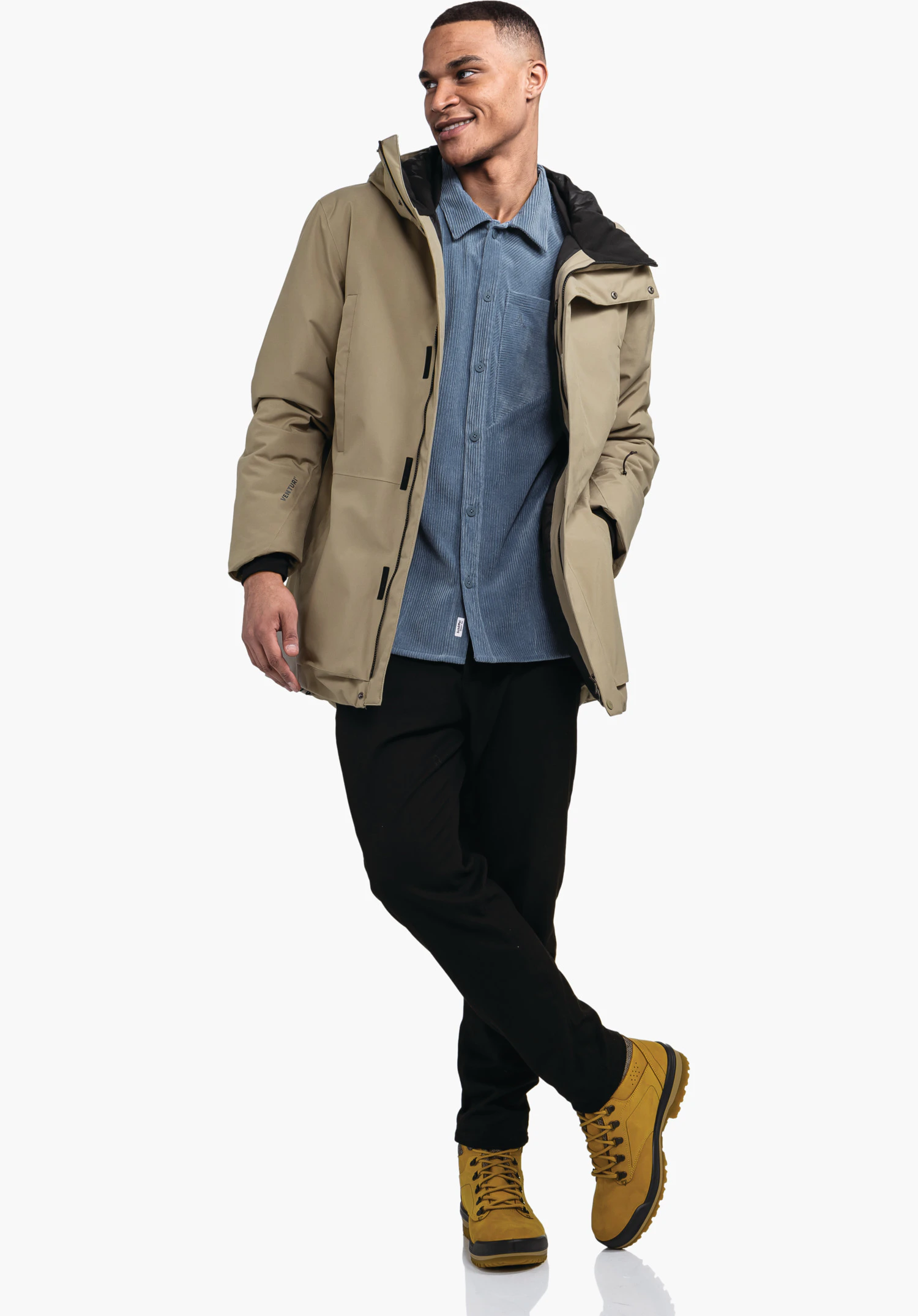 Ins Parka Style Crivat MNS zeigt die feine braune Gewebestruktur sowie die Windschutzleiste mit den markanten schwarzen Details. Detailaufnahme vor weißem/neutralem Hintergrund.
