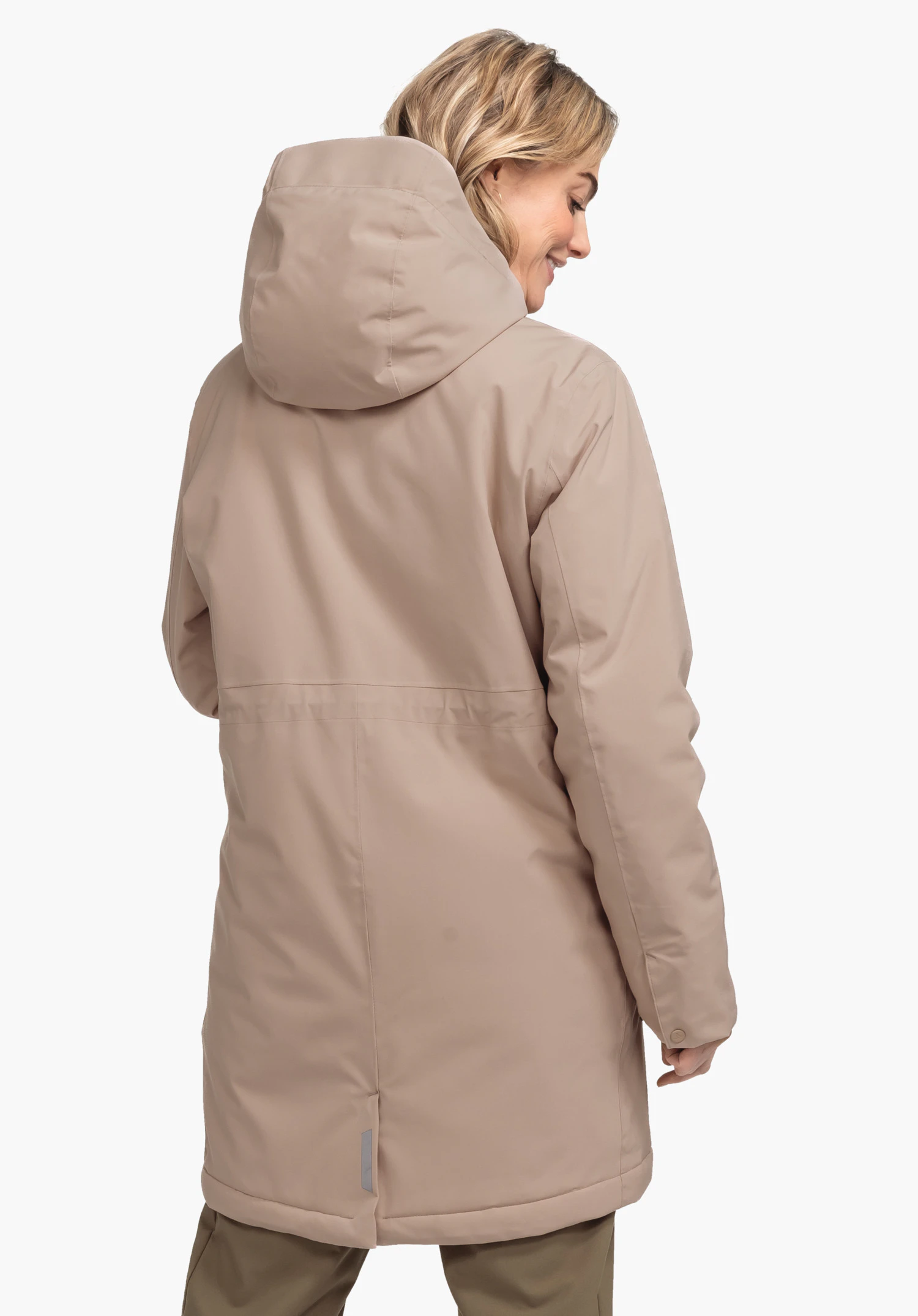 Ins Parka Style Crivat WMS light brown parka worn by a woman standing with her back to the camera, head turned right and smiling; neutral light studio background.