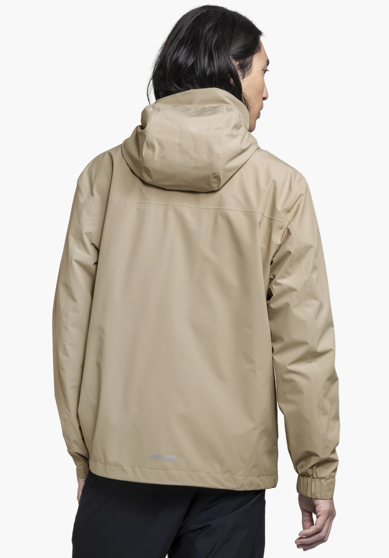 Jacket Style Bohorok MNS in beige, rear view of the model wearing the hood against a neutral background.