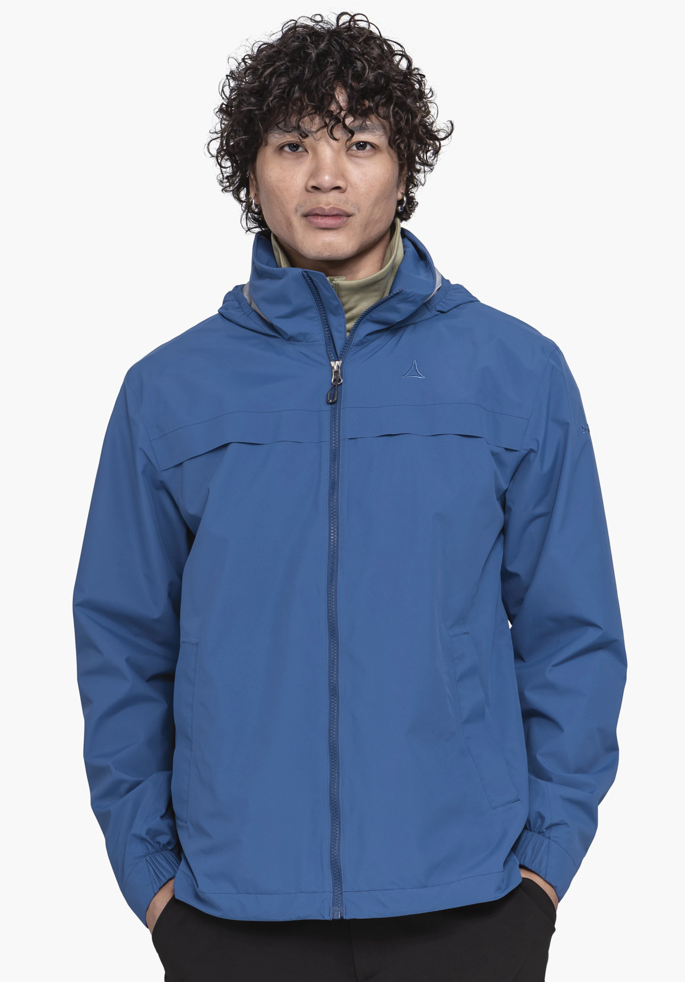 Jacket Style Bohorok MNS is worn by a model standing frontally. The blue jacket features the visible Schöffel logo on the chest and is presented against a neutral background.