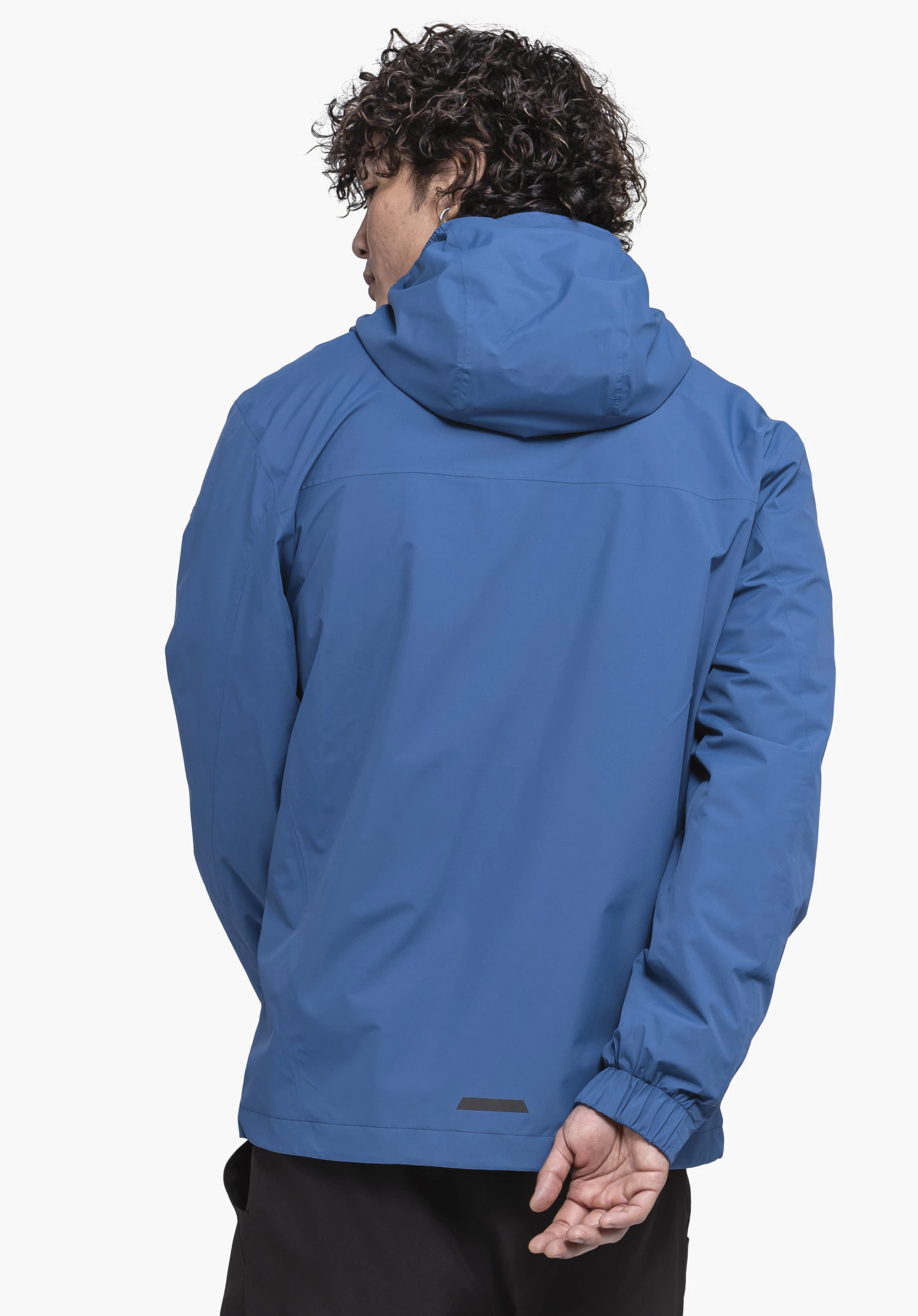 Jacket Style Bohorok MNS in blue, rear view on a model against a neutral background.