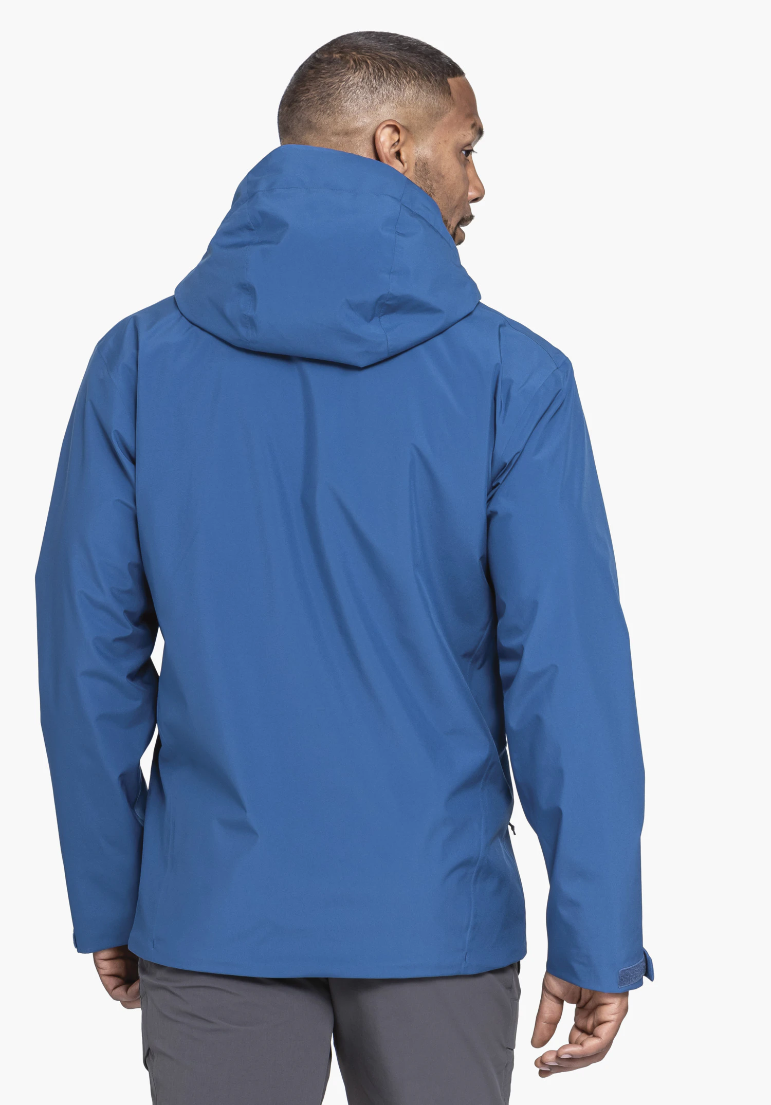 Jacket Style Mauku MNS in Blau in der Rückenansicht vor neutralem Hintergrund.