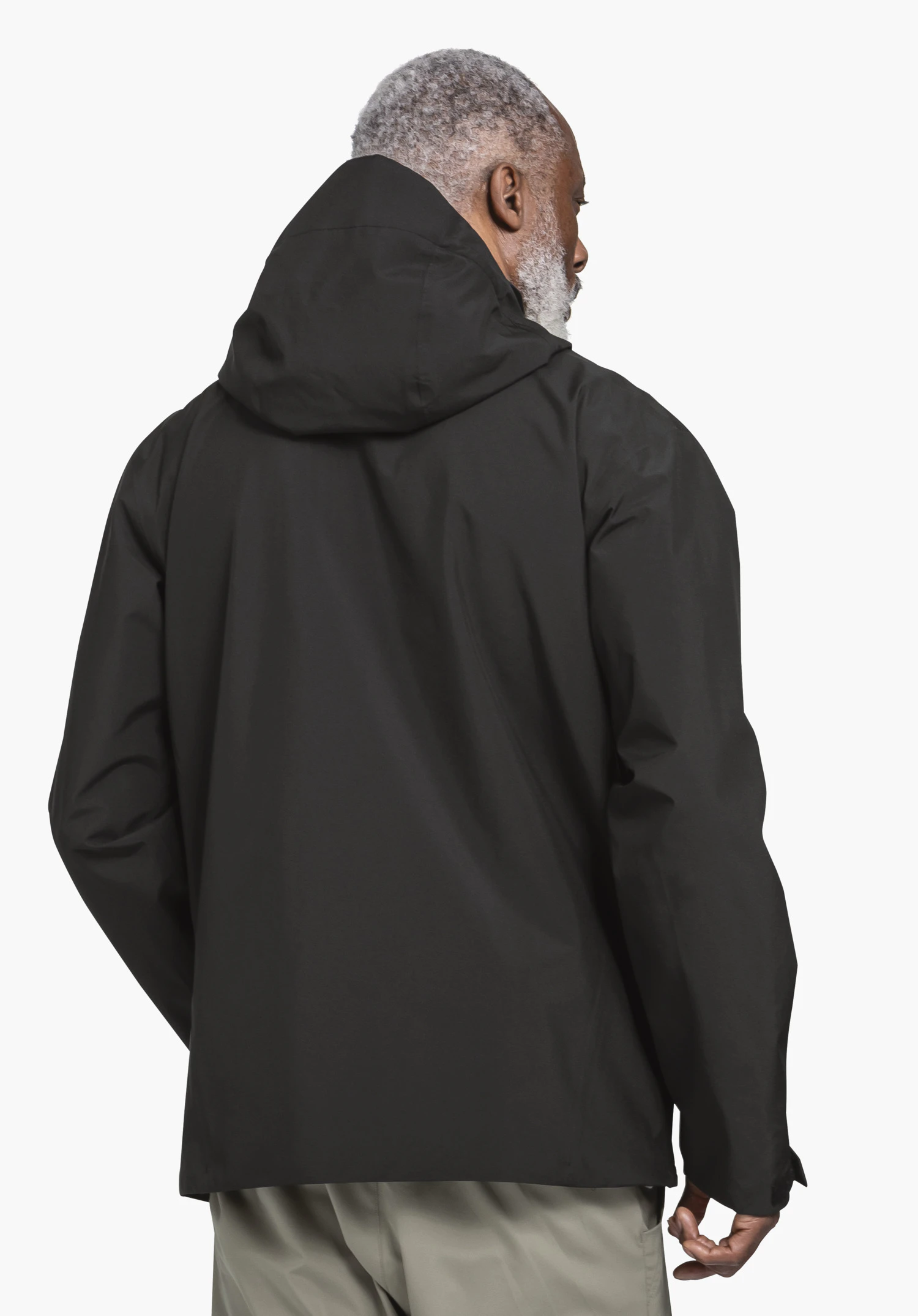 Jacket Style Mauku MNS in black, shown from the back on a model against a neutral background.