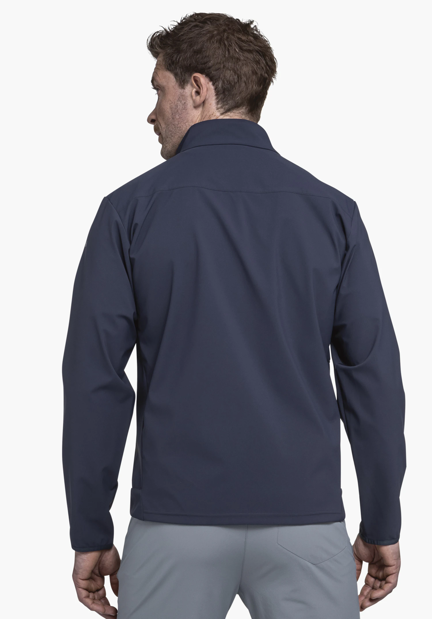 Softshell Jk Style Mirusha MNS in blue in a rear view on a model against a neutral background with the Schöffel logo visible on the sleeve.