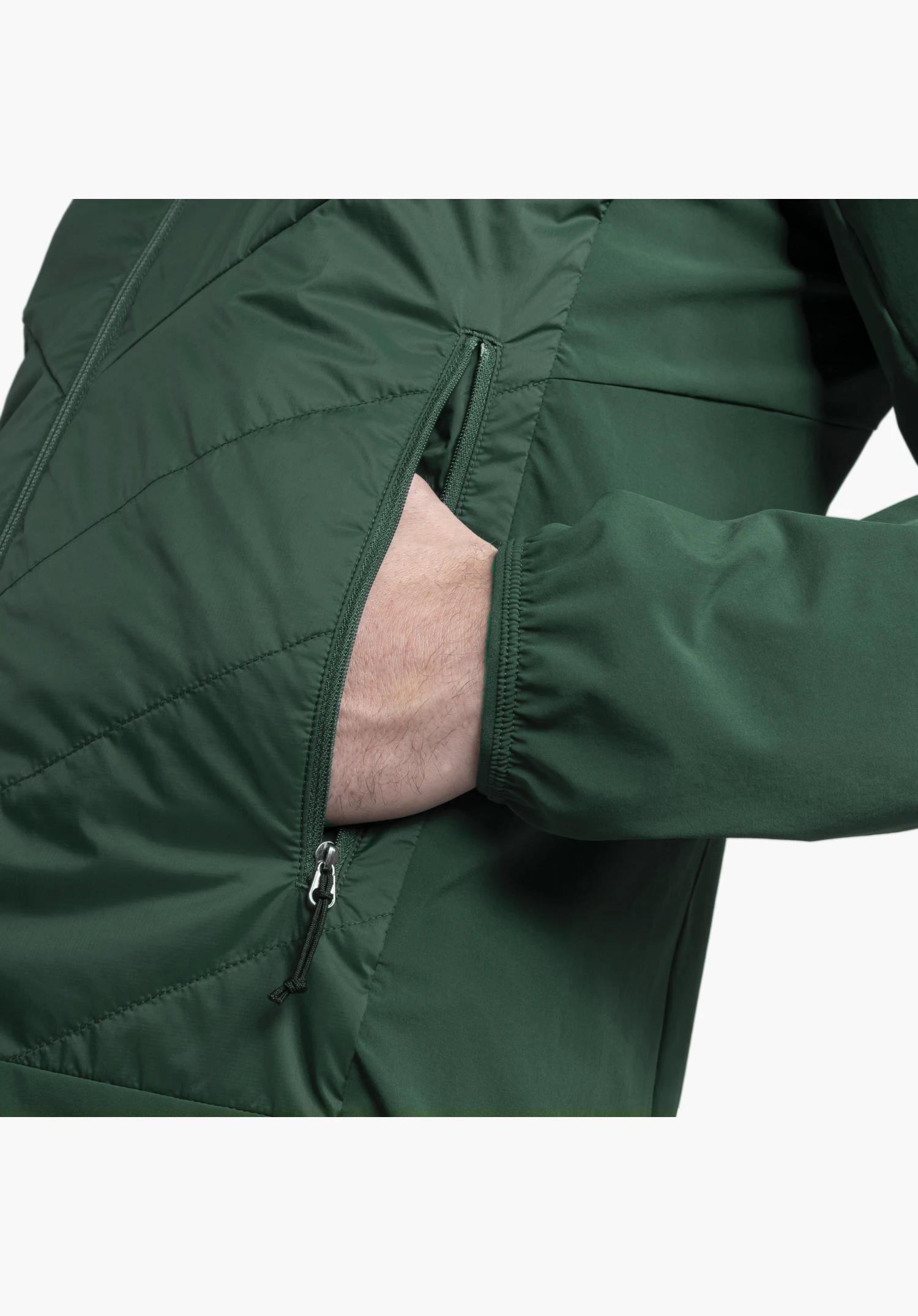 Hybrid Jk Style Blaueis MNS features the open side zip pocket with a pull cord and the elasticated sleeve cuff in green. Close-up in front of a white/neutral background.