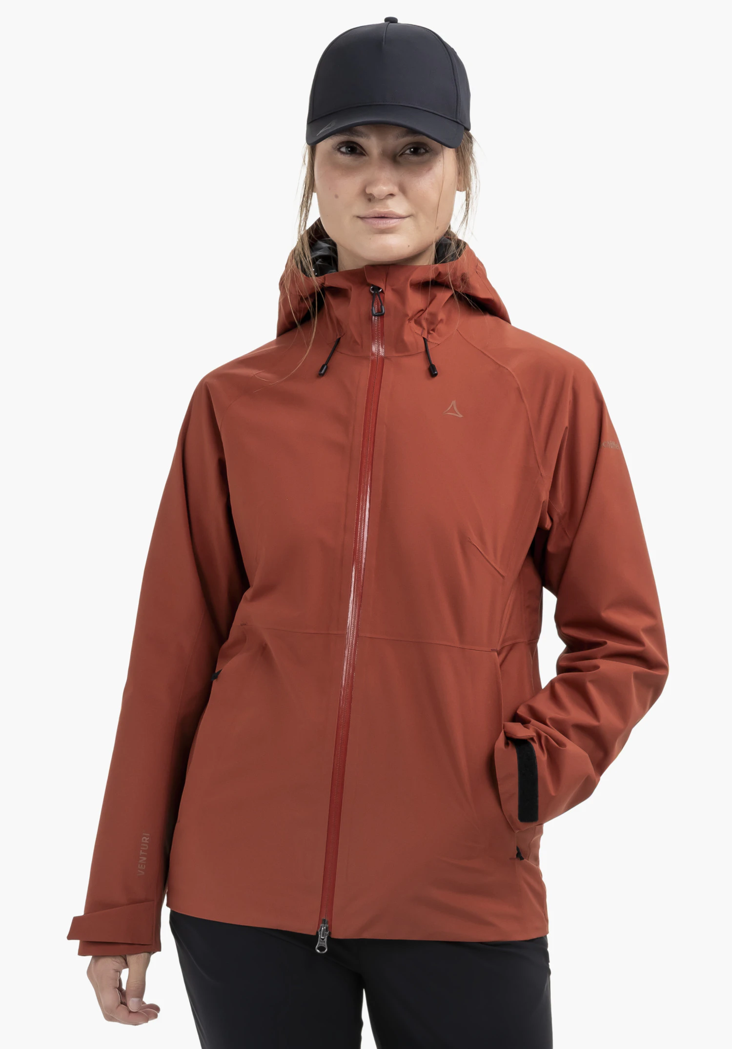 Jacket Style Mauku WMS in red, worn by a model standing facing forwards with one hand in the pocket. The Schöffel logo is clearly visible on the left chest, presented against a neutral background.