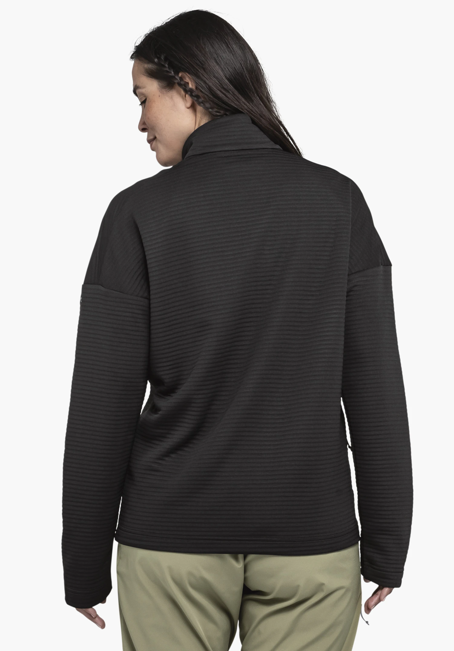 CIRC Fleece Jk Style Smue WMS in black, presented by a model in a back view. The model is standing and looking slightly over her shoulder against a neutral background.