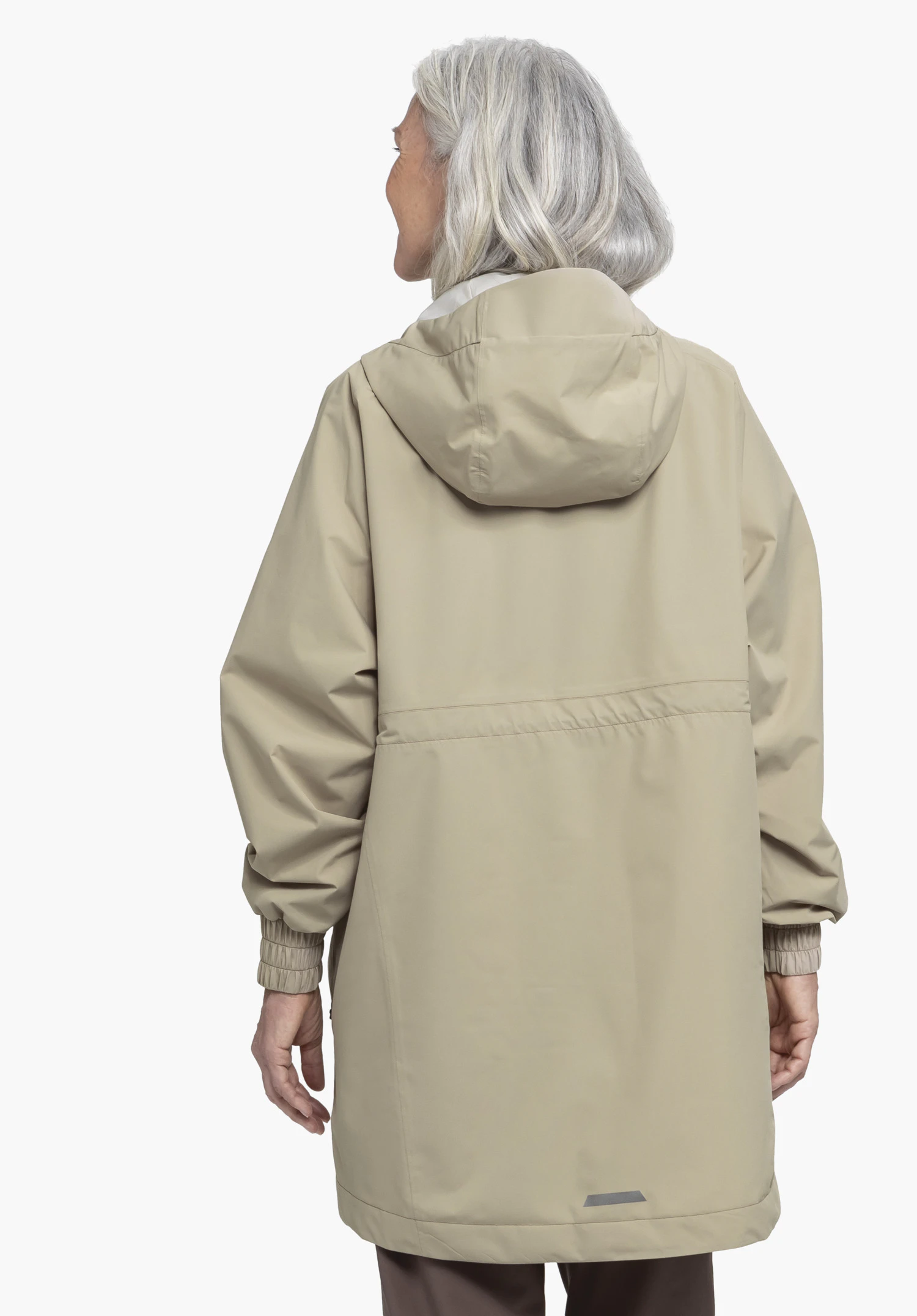 Parka Style Bohorok WMS worn by a model in a back view. The beige jacket features a hood, a waist seam and elasticated cuffs against a neutral background.