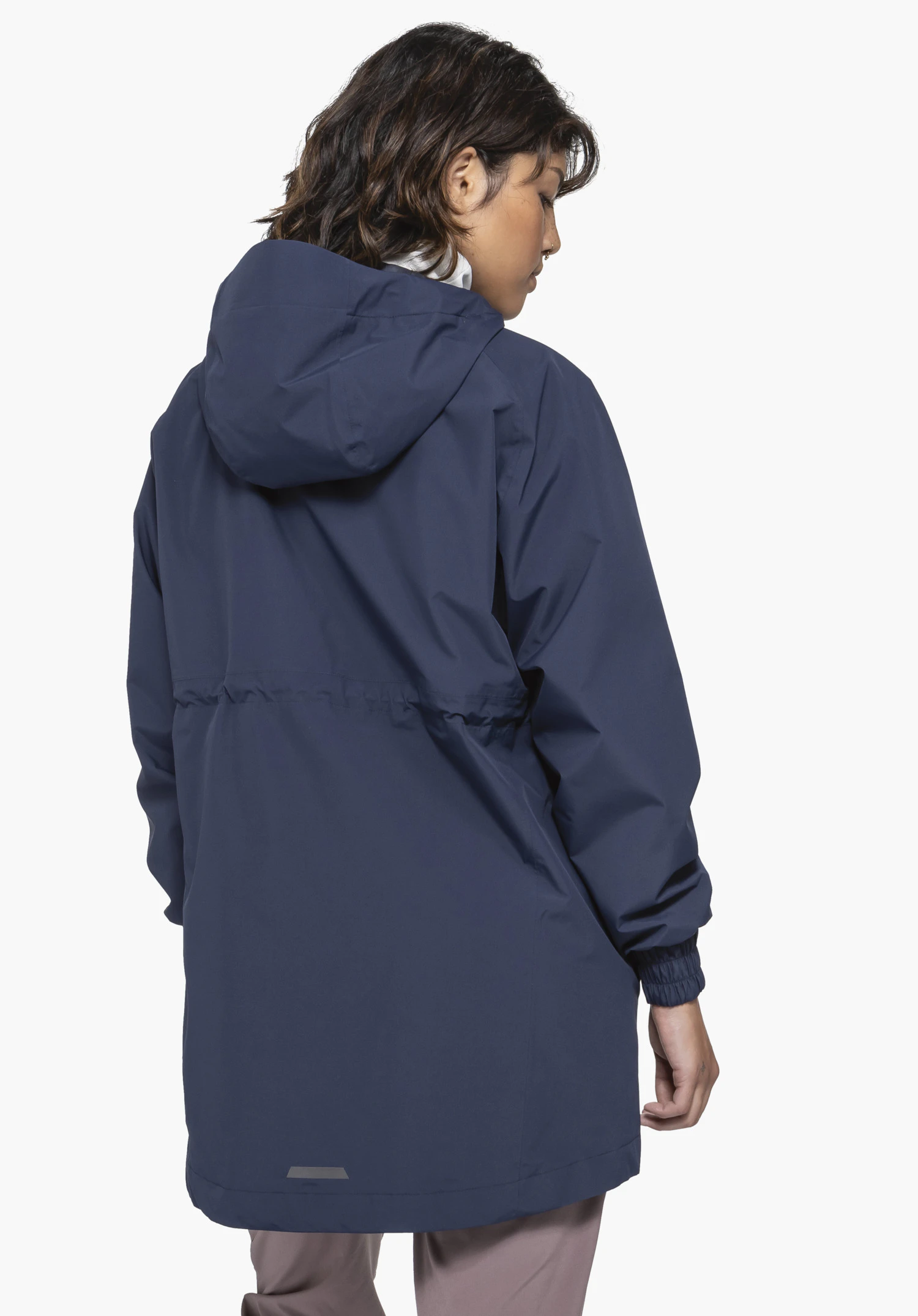 Parka Style Bohorok WMS in blue. A model showcases the jacket in a back view, highlighting the hood and cinched waist against a neutral background.