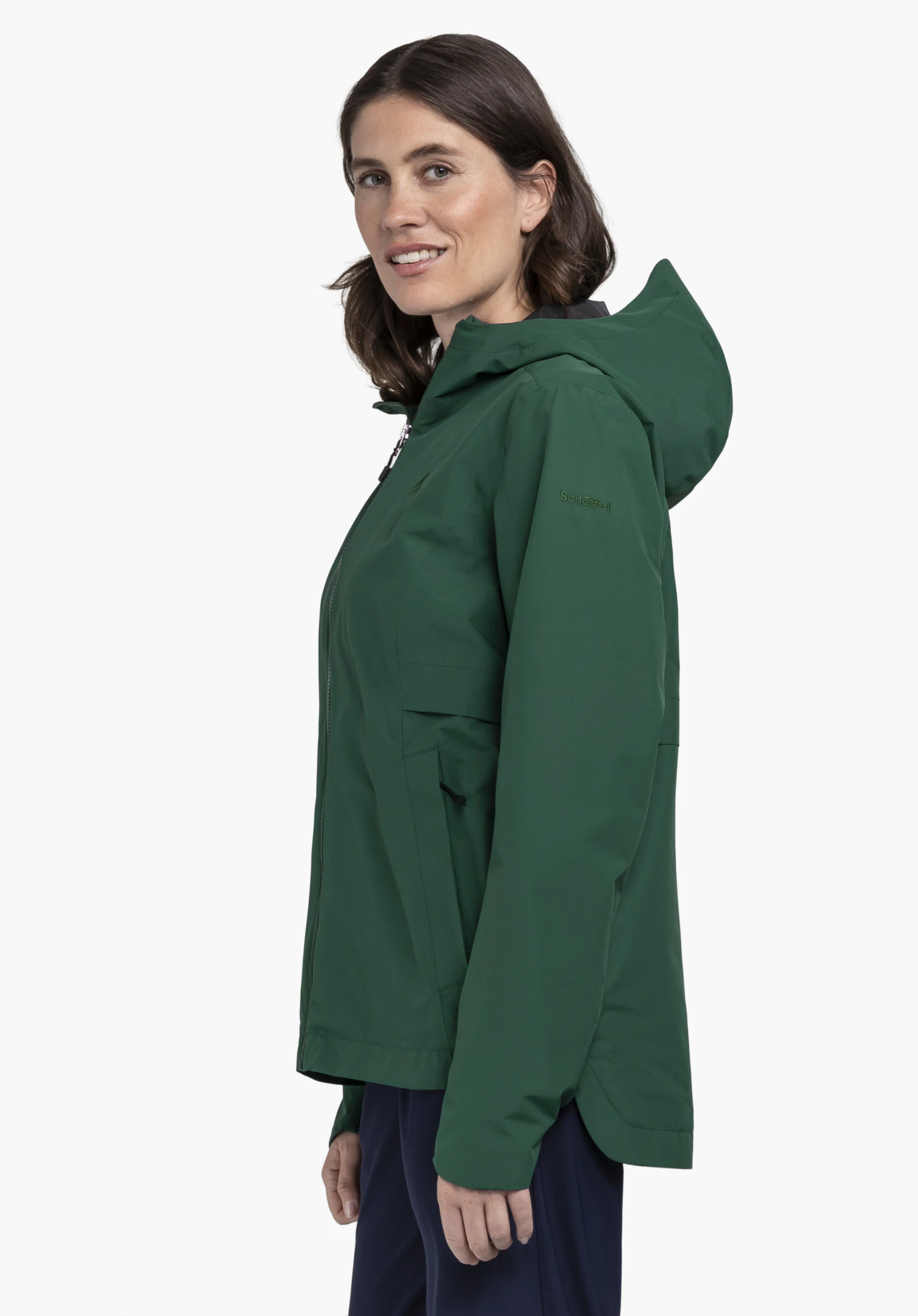 Jacket Style Bohorok WMS seen from the side against a neutral background. The jacket comes in a rich green and features the subtle Schöffel logo on the upper arm, showcasing the perfect style for winter adventures.