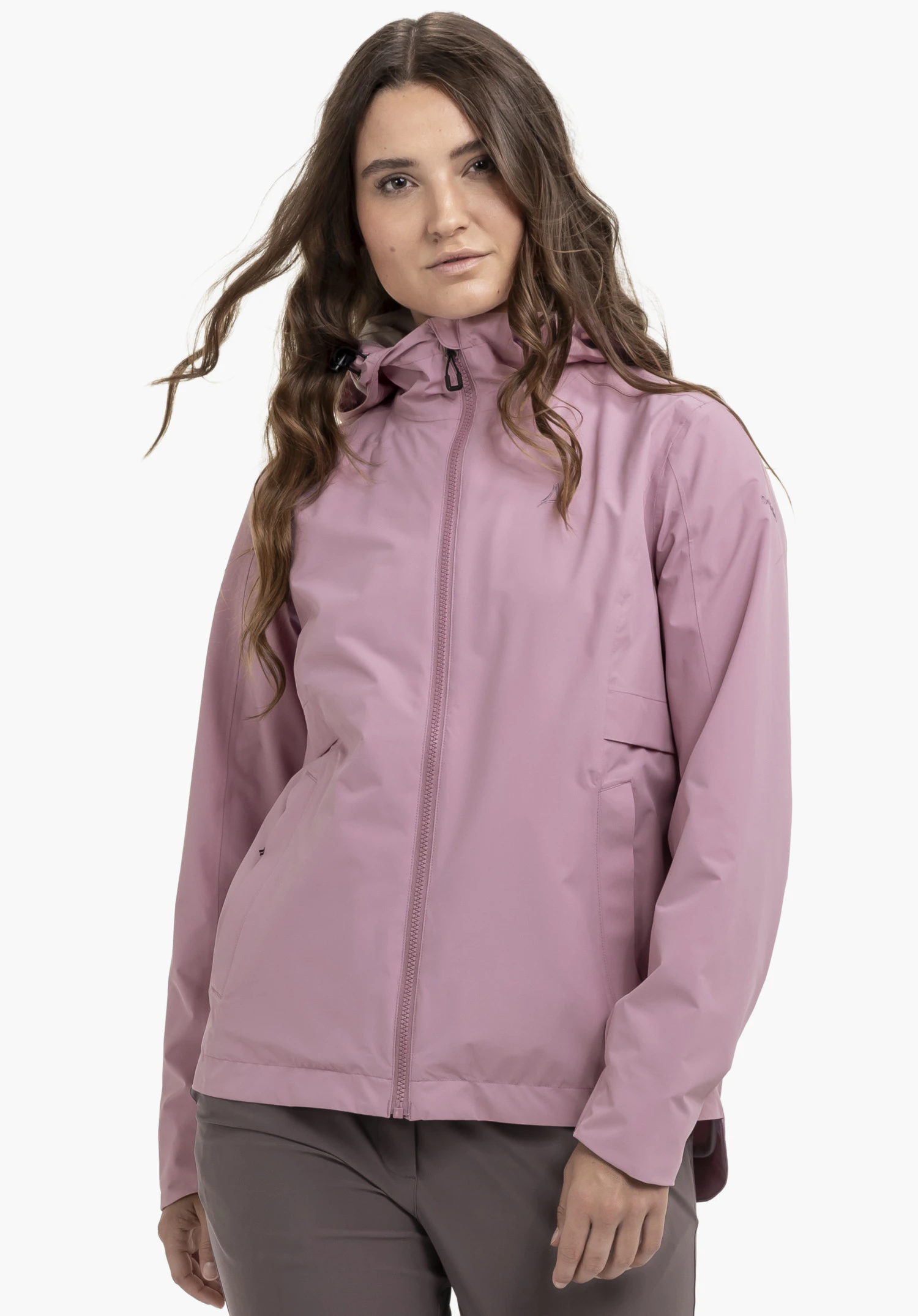 Jacket Style Bohorok WMS: A woman showcases the jacket in a soft pink. She stands facing the camera against a neutral background, with the subtle Schöffel logo visible on the chest.