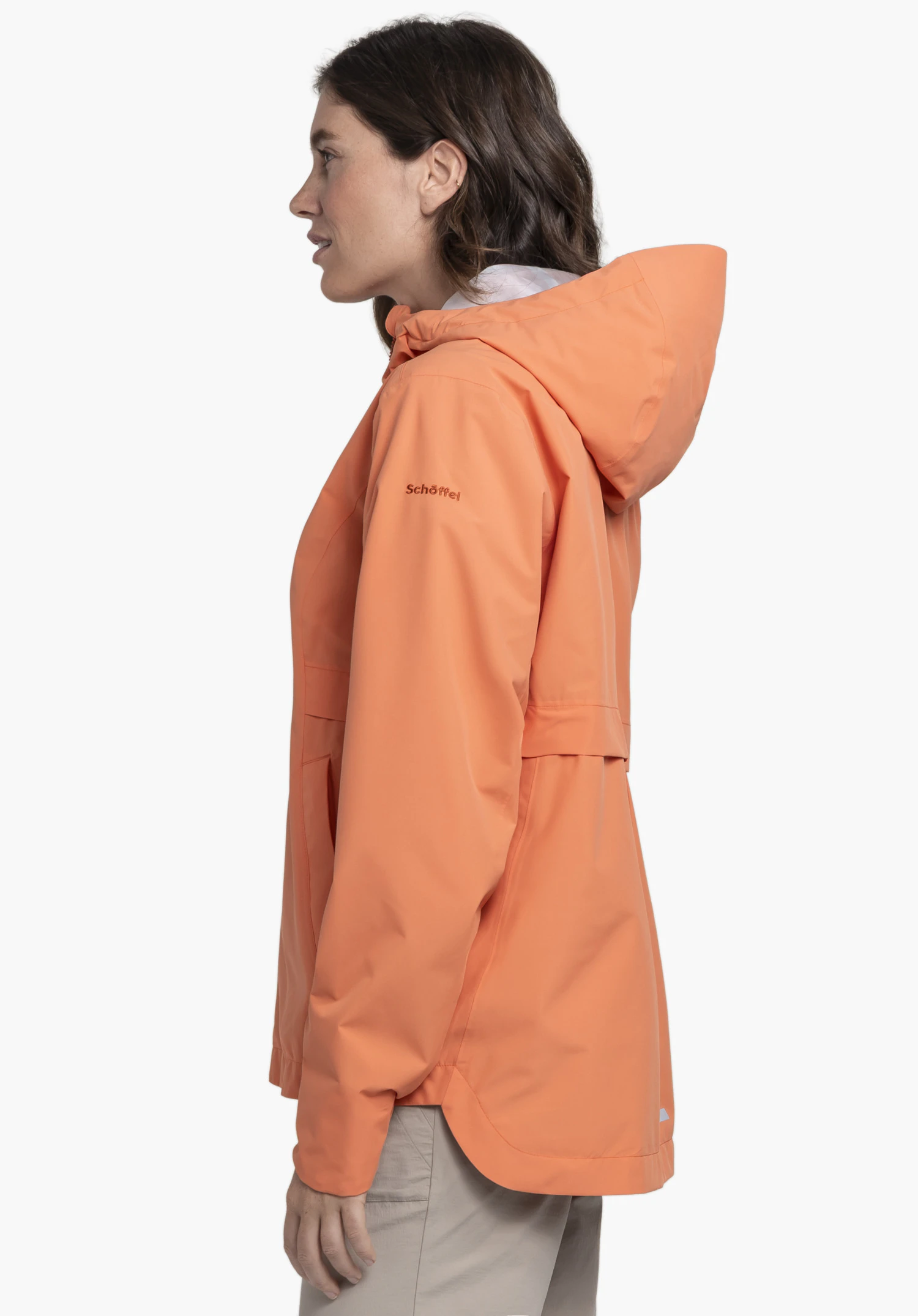 Jacket Style Bohorok WMS in vibrant orange against a neutral background: The image shows the model from the side, highlighting the jacket's cut and hood. The subtle Schöffel logo on the upper arm emphasizes its premium quality.