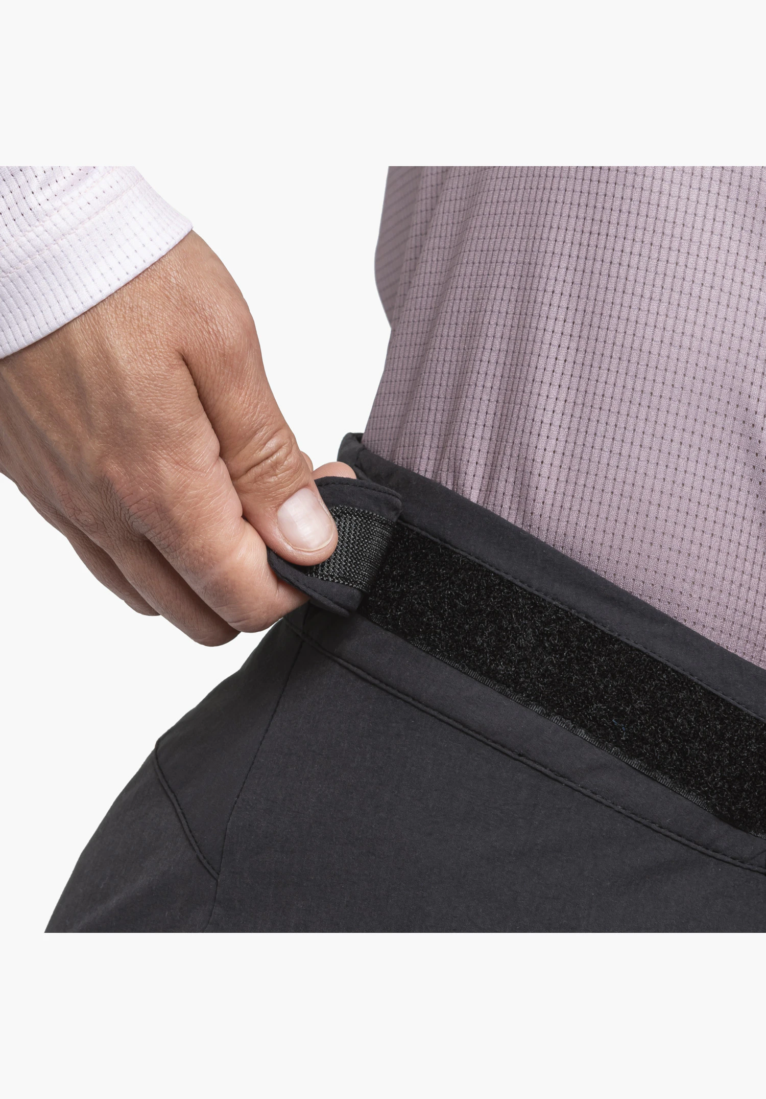 Shorts Style Puula WMS featuring the internal waist adjustment via hook-and-loop fastener on the black fabric, close-up against a white/neutral background.