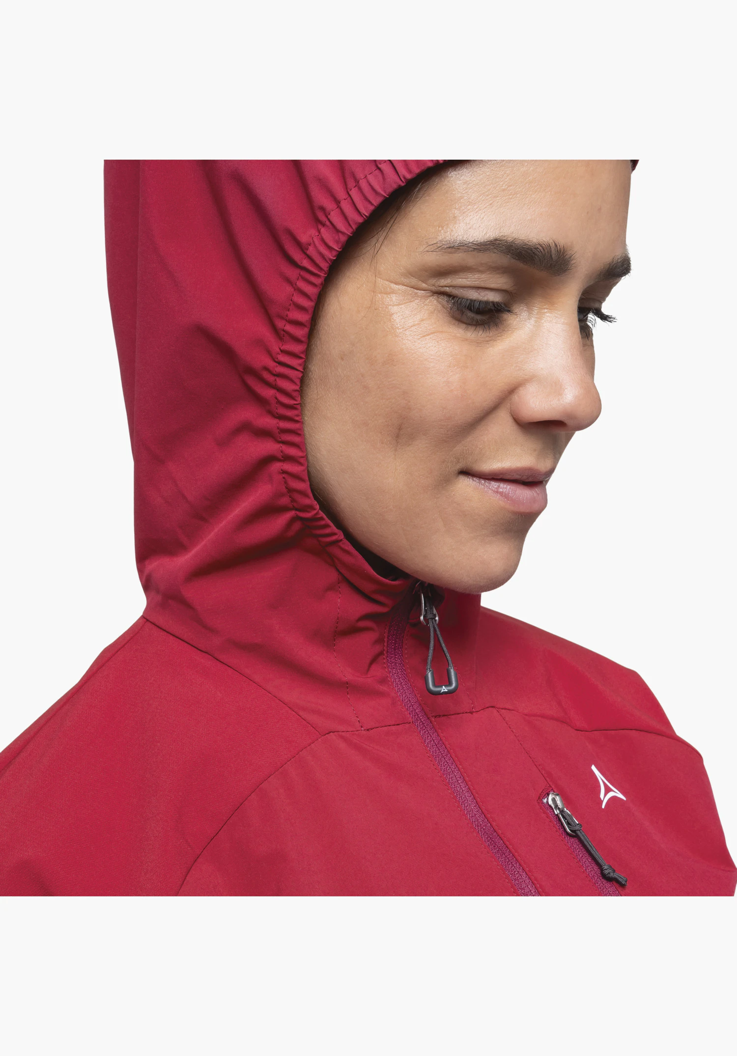 Hybrid Jk Style Mamry WMS, detailed focus on the front zip with puller, the elasticated hood edge of the red fabric and the white Schöffel logo on the chest, close-up against a white background.