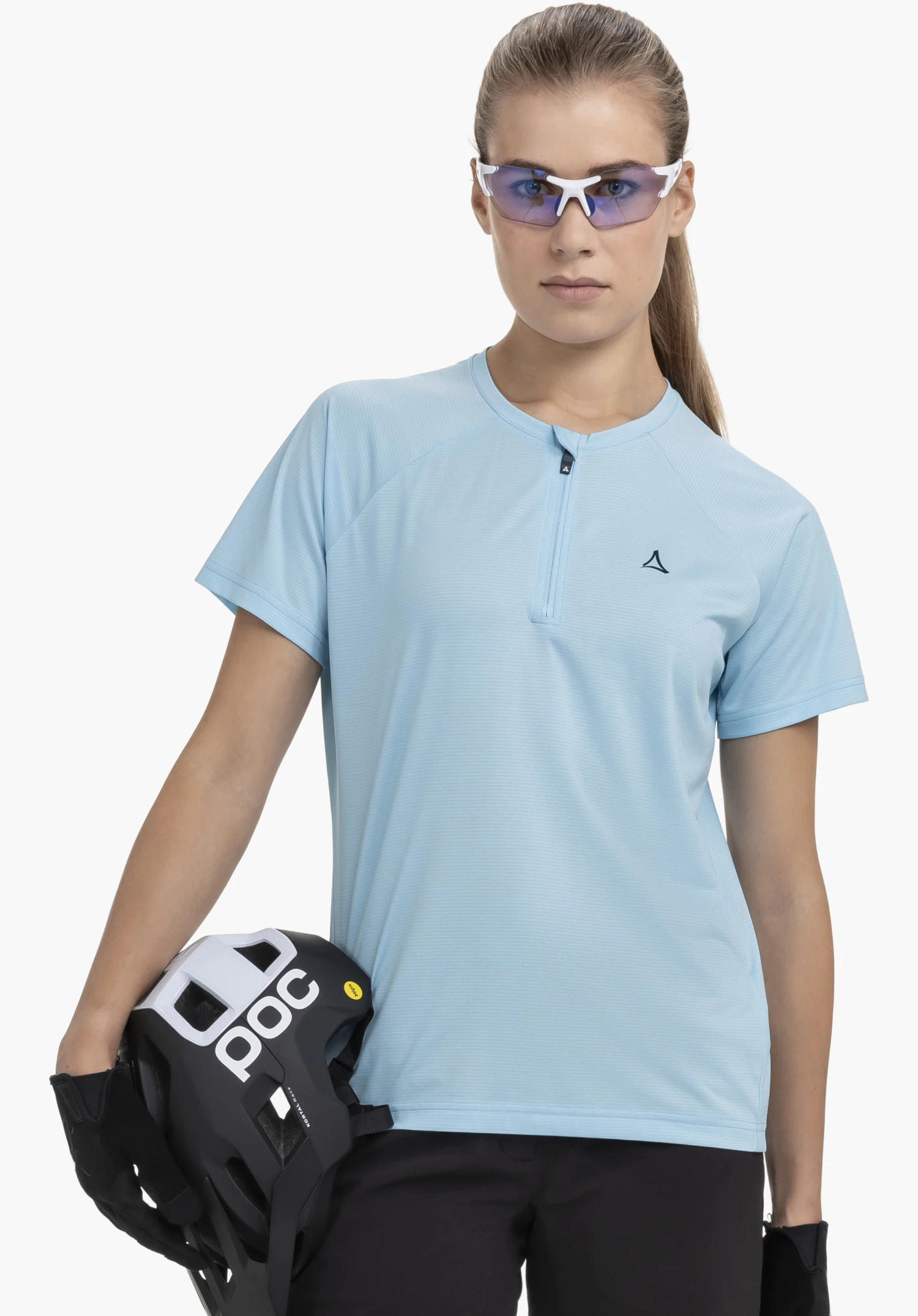 CIRC Shirt Style Wetluga WMS shows the short front zip, the Schöffel logo on the chest and the fine texture of the blue fabric as a detail. Close-up in front of a white/neutral background.