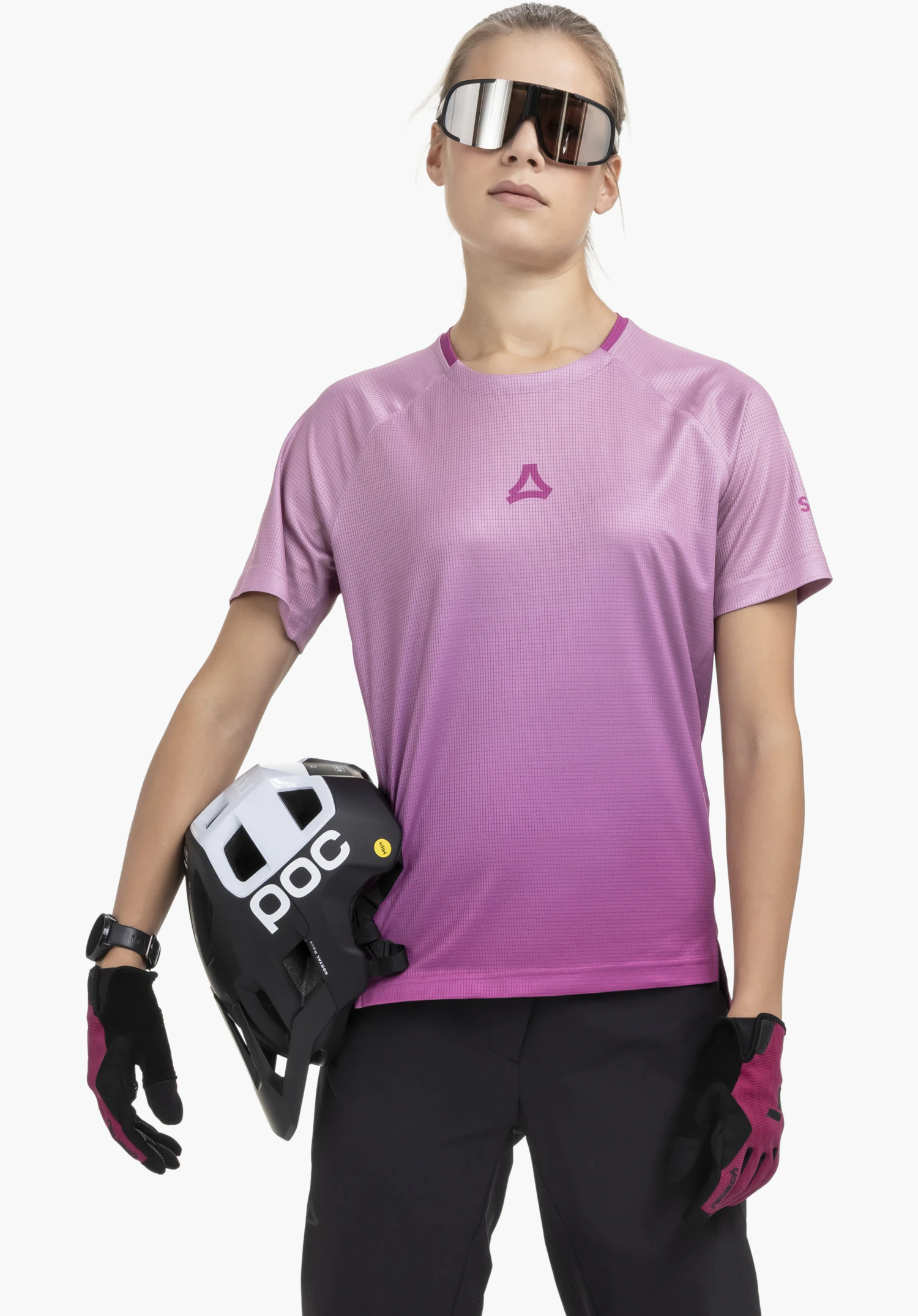 Shirt Style Koitere WMN, focus on the centrally placed Schöffel logo on the moisture-wicking pink fabric with a fine grid structure, close-up against a white/neutral background.
