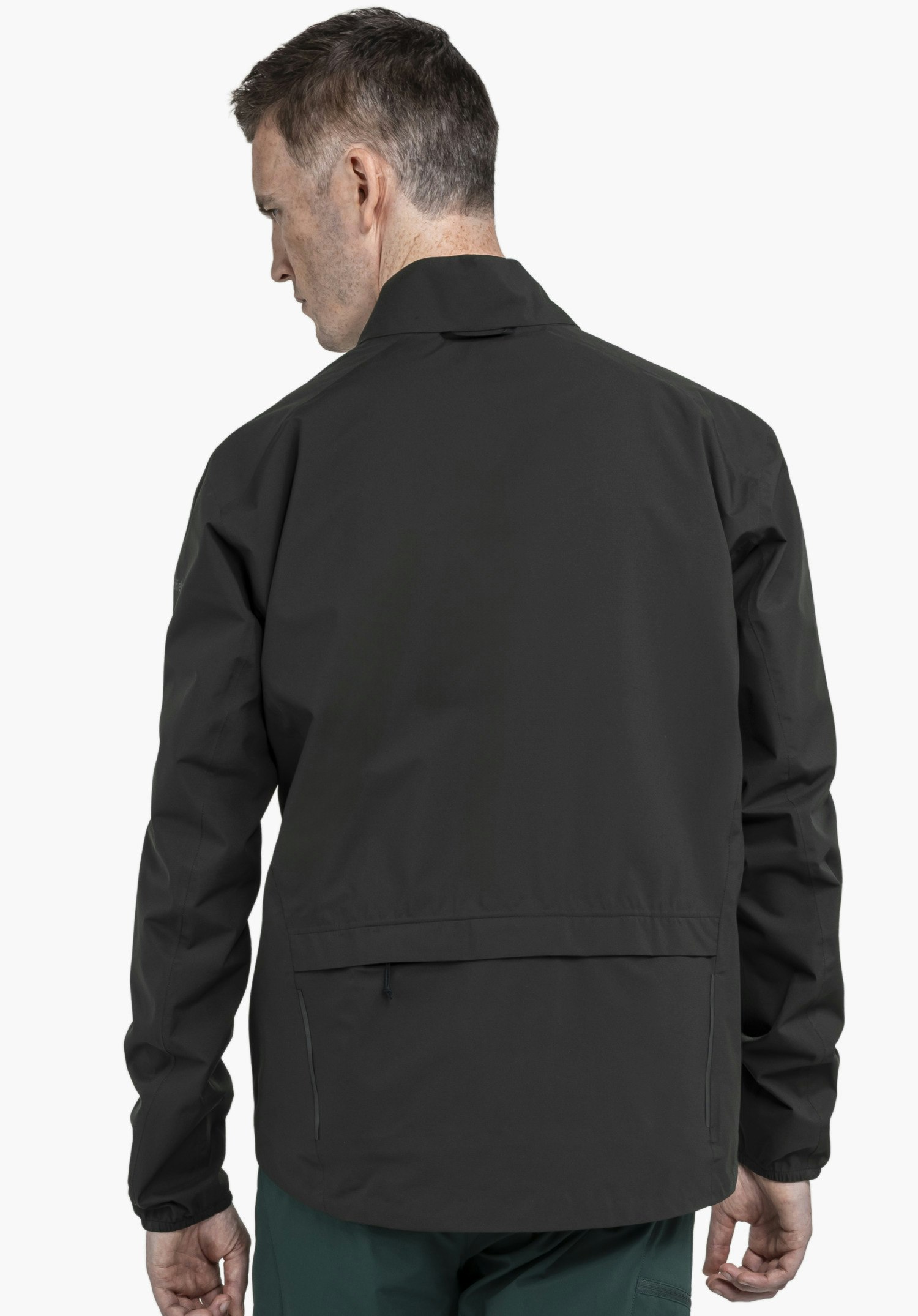 Jacket Style Lurbek MNS in black, back view on a model against a neutral background with the Schöffel logo visible on the sleeve.