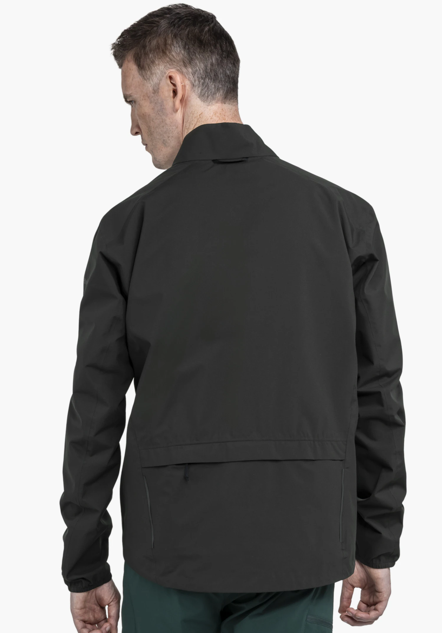 Jacket Style Lurbek MNS in black, back view on a model against a neutral background with the Schöffel logo visible on the sleeve.