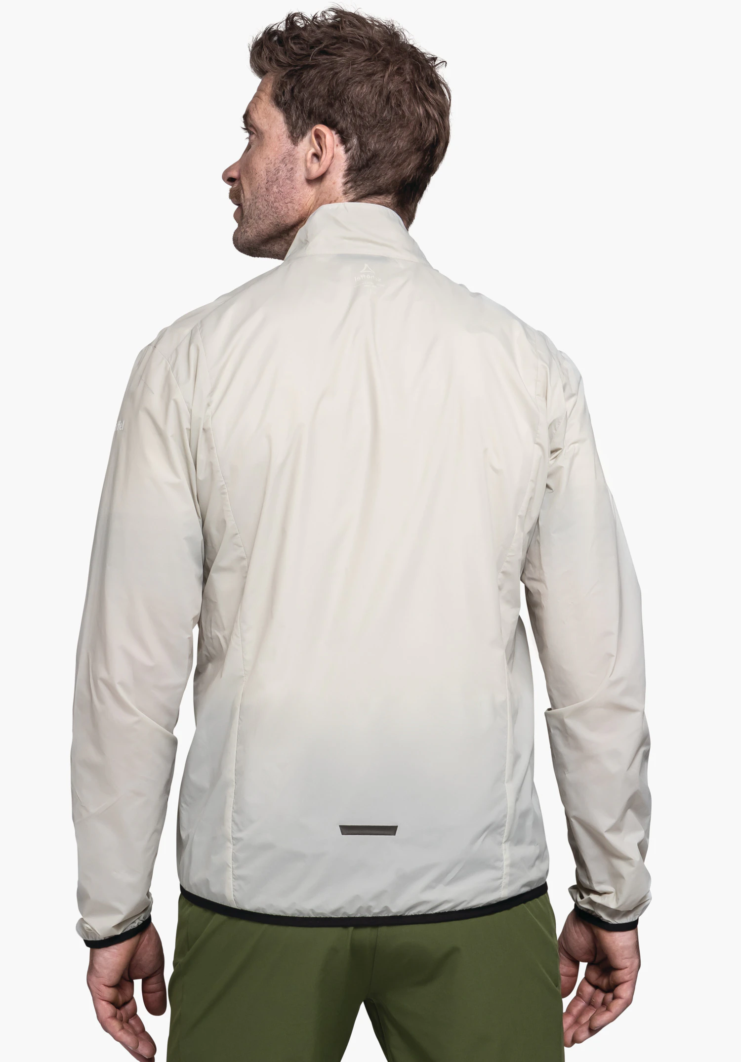 Jacket Style Cannobio MNS in the colour natur: The model is shown from the back wearing the jacket against a neutral background. The Schöffel logo is subtly placed in the neck area.