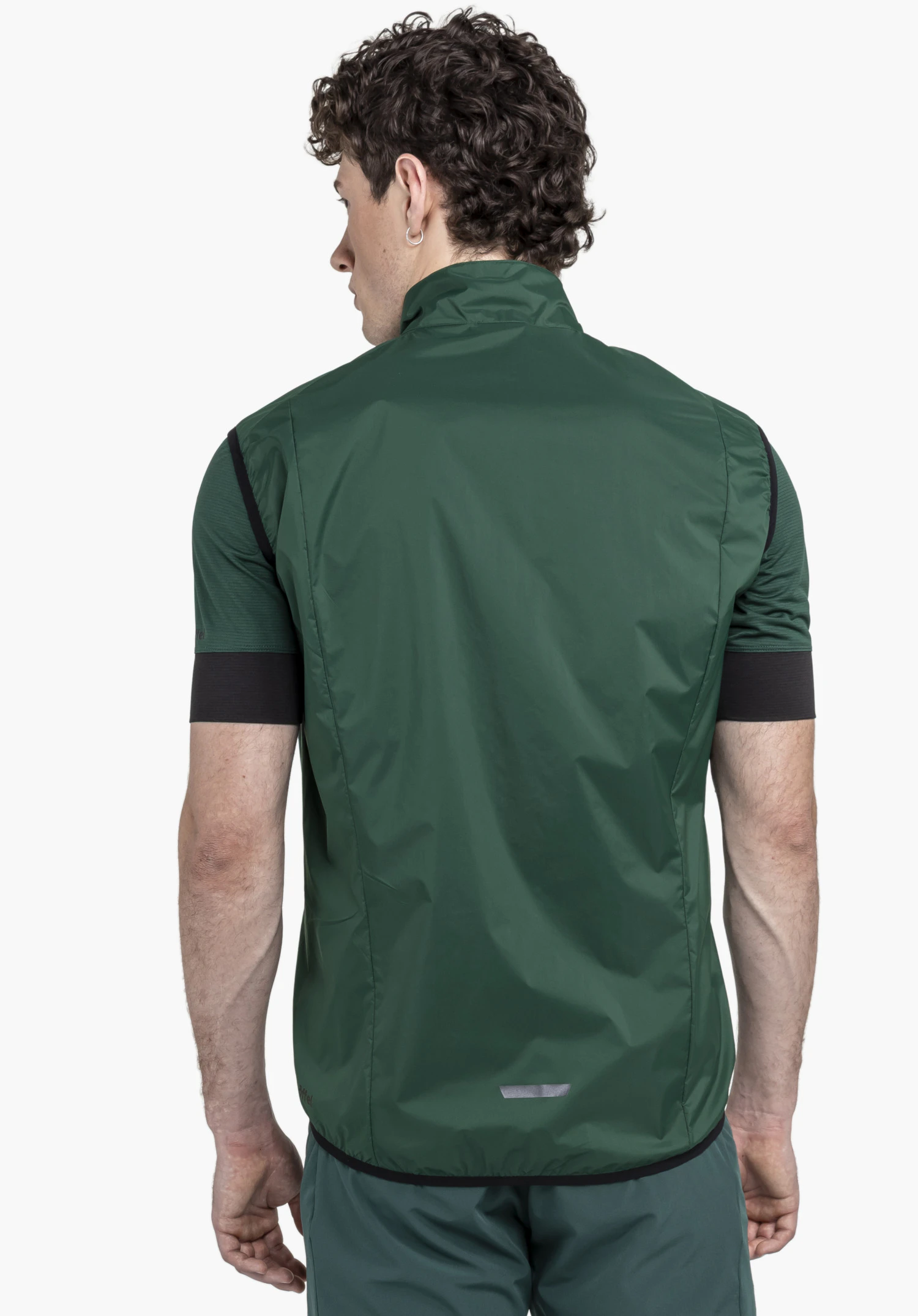 Vest Style Cannobio MNS in a rear view on a model in green against a neutral background with a visible Schöffel logo at the hem.