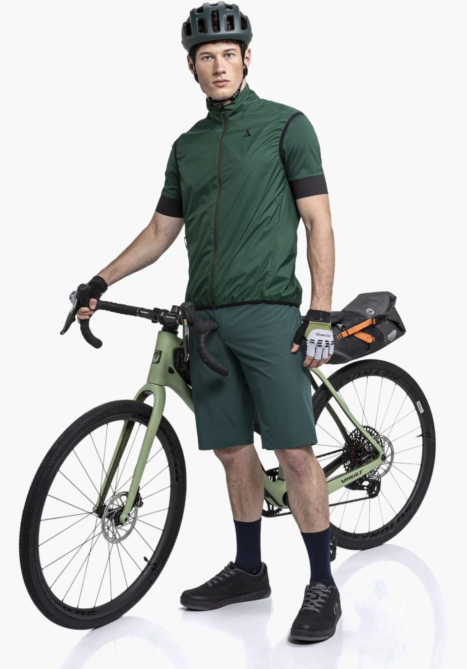 Vest Style Cannobio MNS showing the texture of the green fabric, the full-length front zip, and the Schöffel-Logo on the left chest, close-up in front of a white/neutral background.