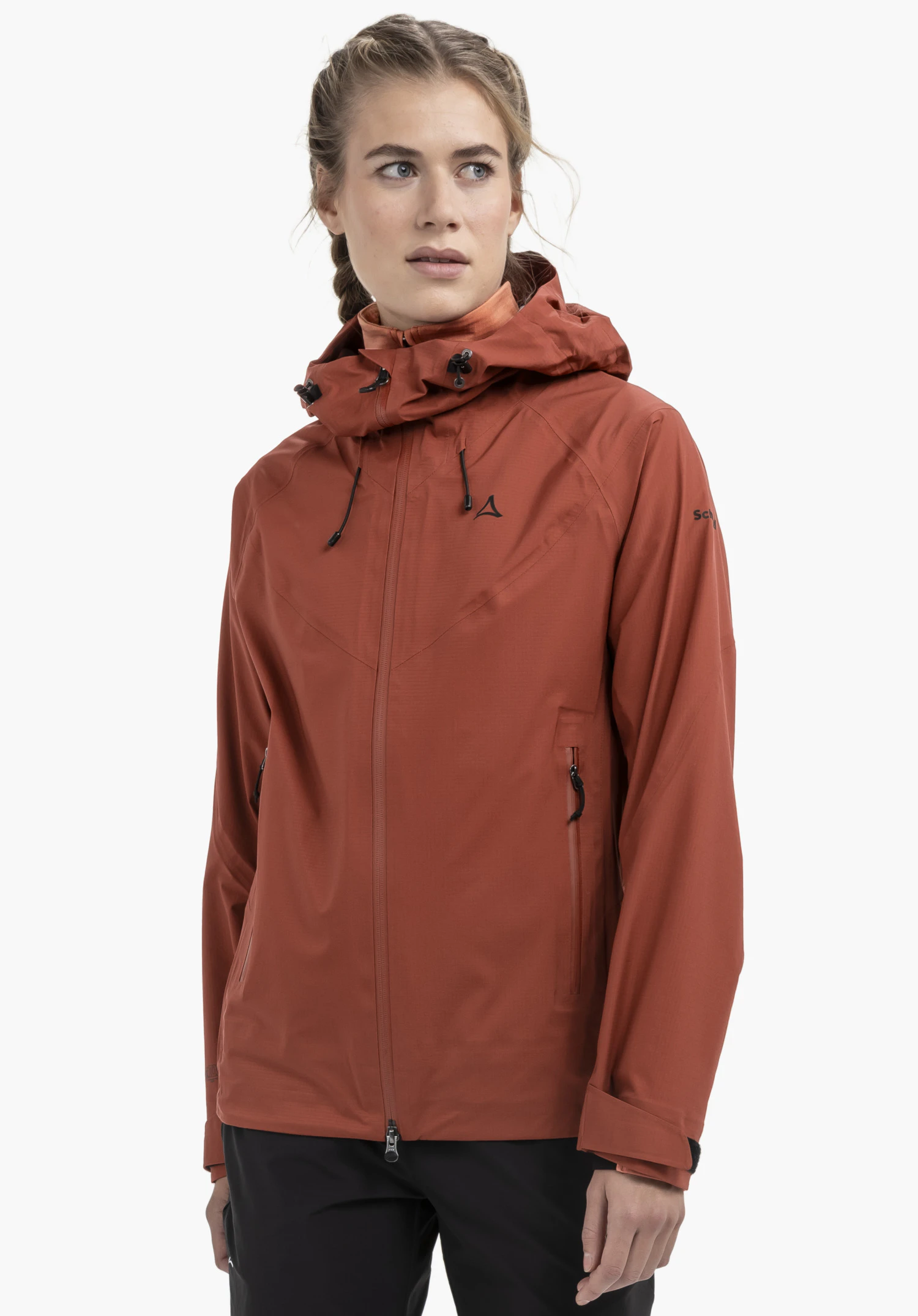 Jacket Style Blaueis WMS on a model standing front-on. The jacket in the colour red features the Schöffel logo on the chest and is shown against a neutral background.