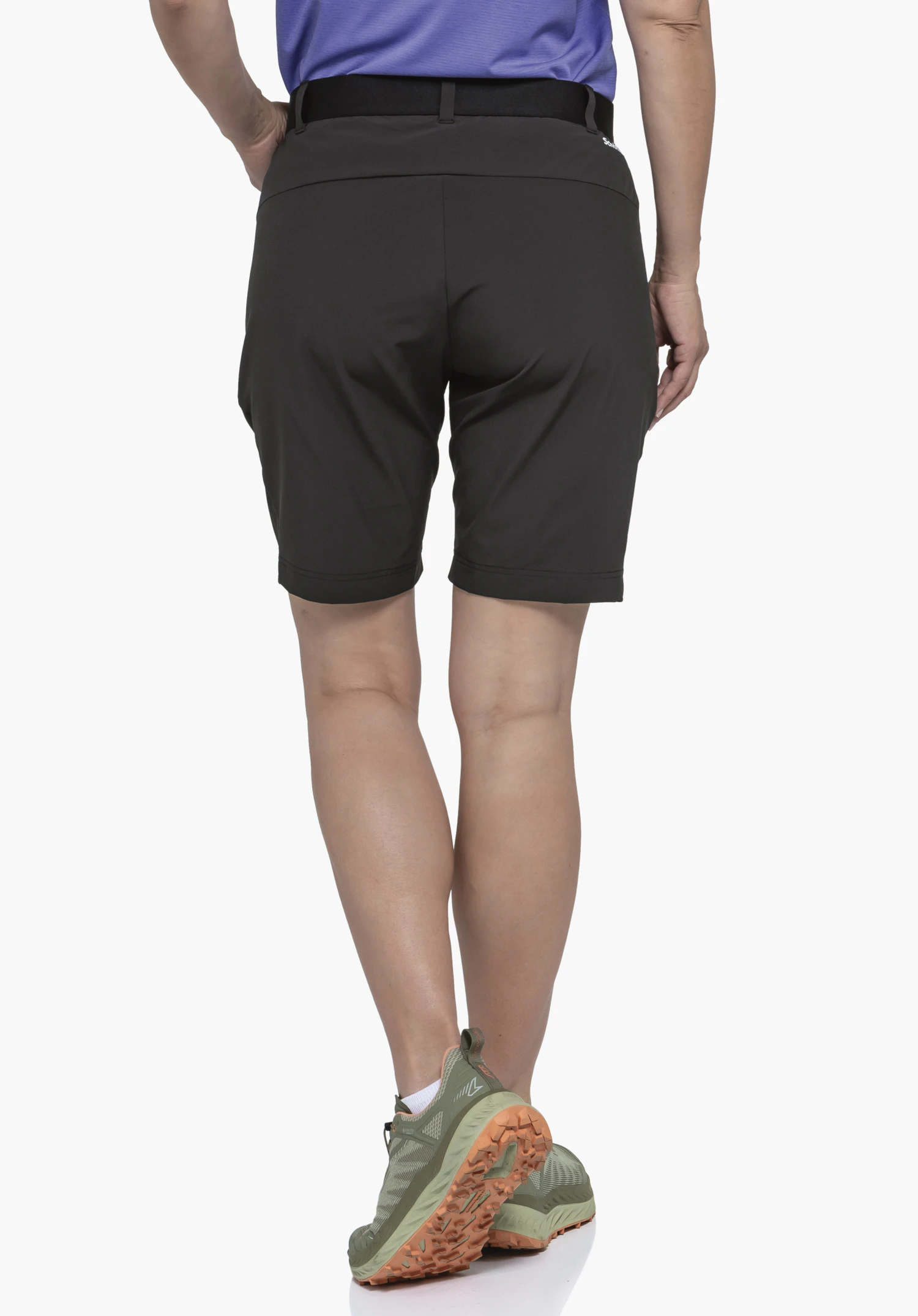Shorts Style Blaustein WMS de couleur noire, porté par un mannequin vu de dos. Un petit logo Schöffel est visible sur le côté droit sous la taille. L'image montre le produit sur un fond neutre.