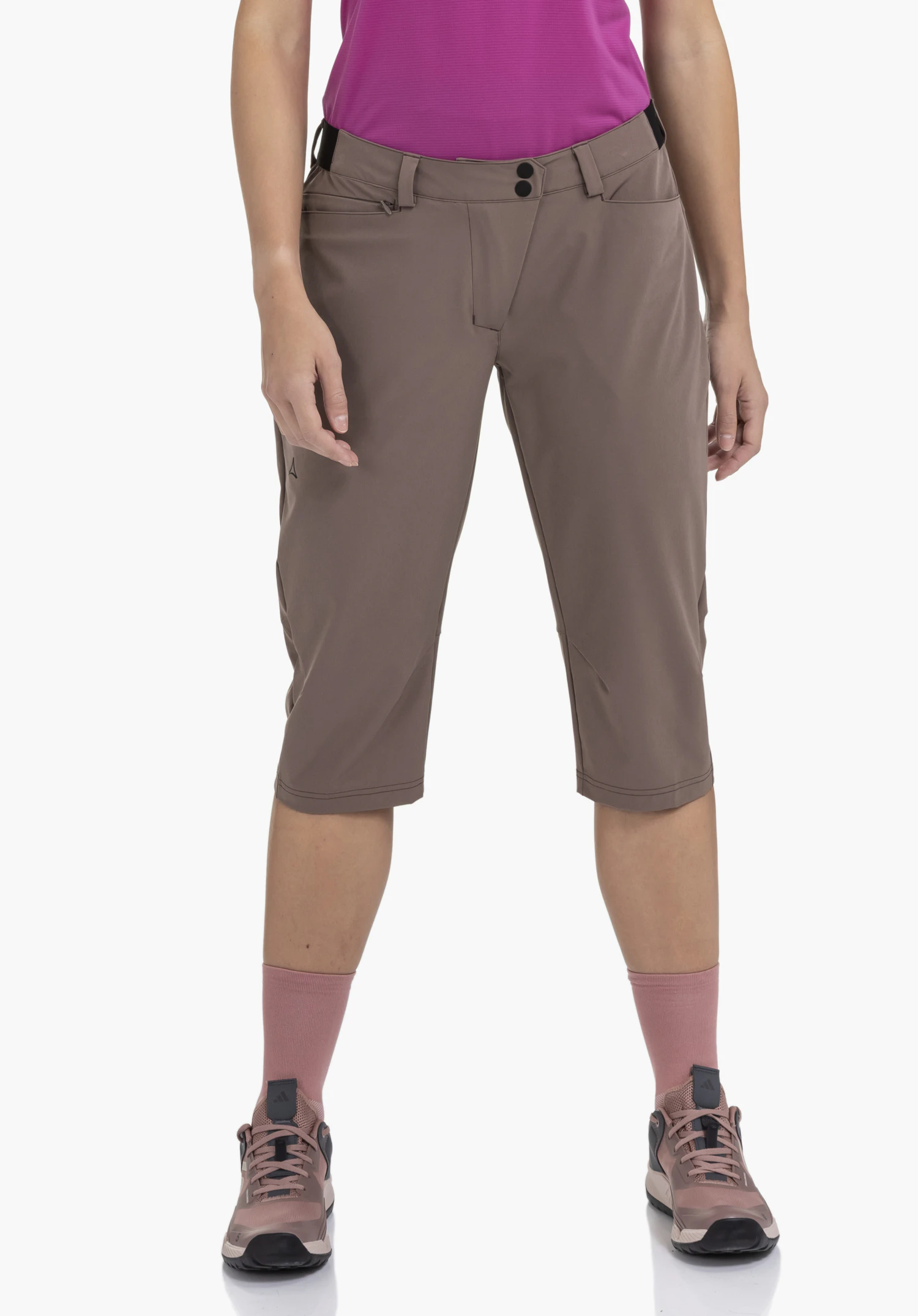 Capri Pants Style Keitele WMS in brown, worn by a model standing facing forwards. The Schöffel logo is visible on the right leg, presented against a neutral background.