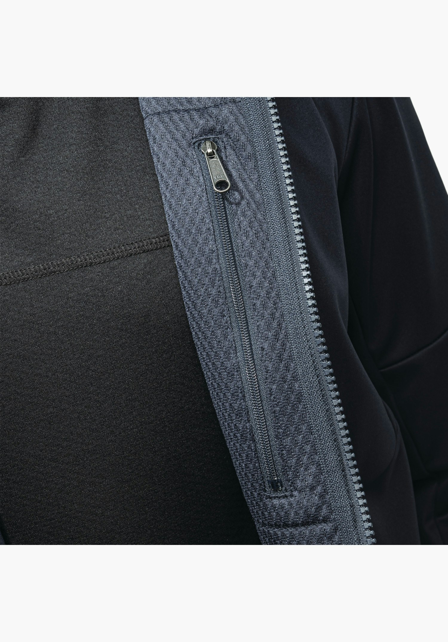 Softshell Jk Style Fracon MNS shows the vertical zip set into a textured blue fabric panel, close-up shot against a white/neutral background.