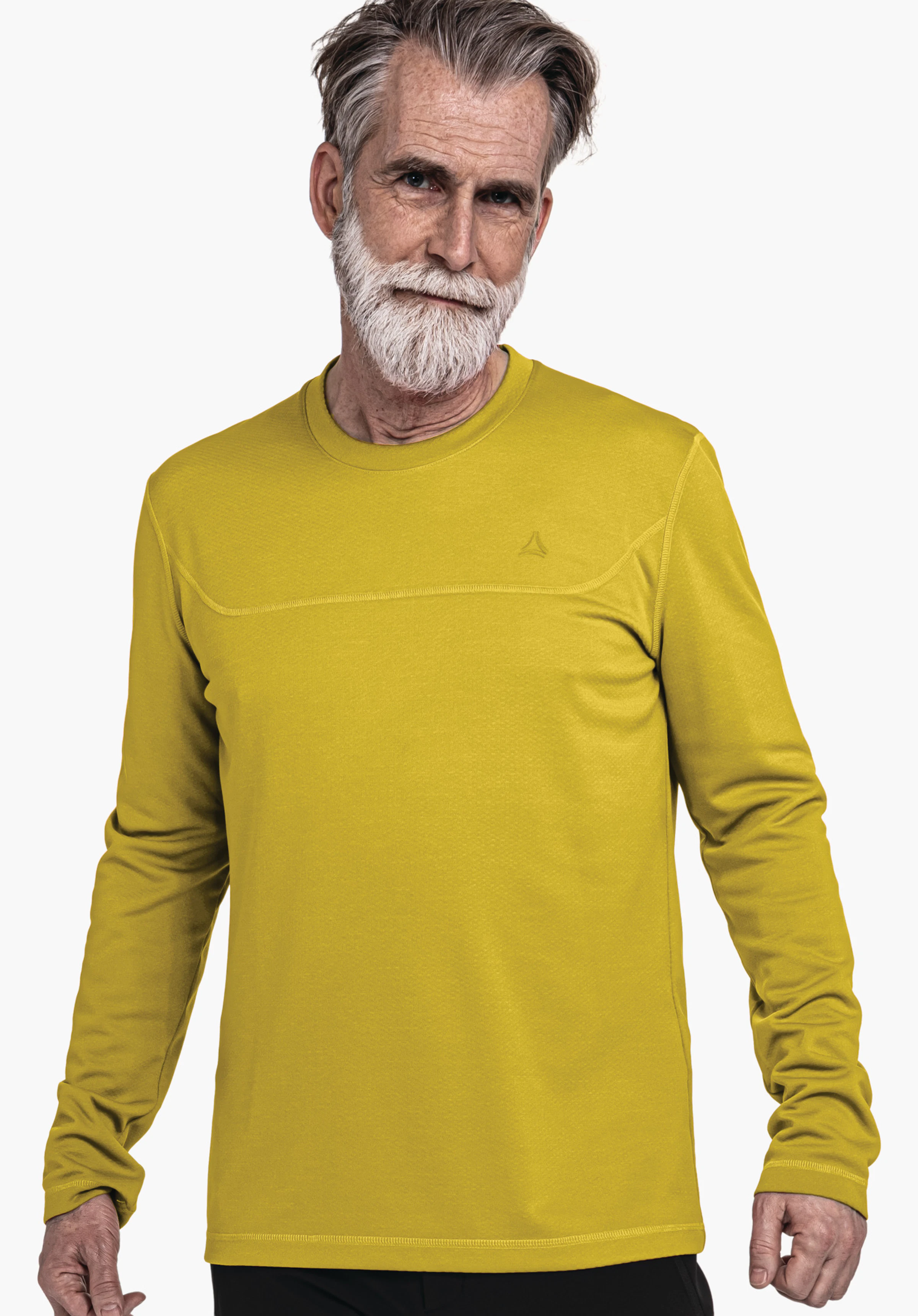 CIRC Longsleeve Style Smue MNS haut à manches longues jaune clair, porté par un homme; logo Schöffel sur la poitrine; debout légèrement de biais et souriant devant un fond studio blanc.