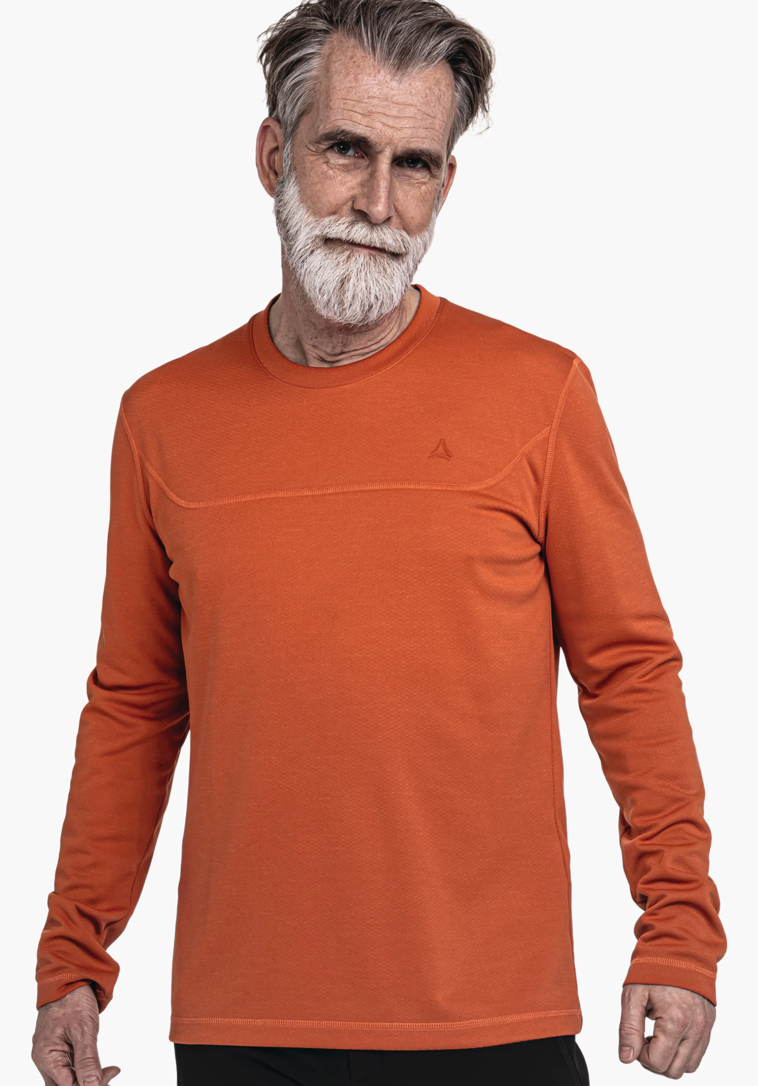 CIRC Longsleeve Style Smue MNS haut à manches longues orange; porté par un homme âgé à barbe blanche, souriant légèrement, devant un fond blanc; logo Schöffel sur la poitrine.