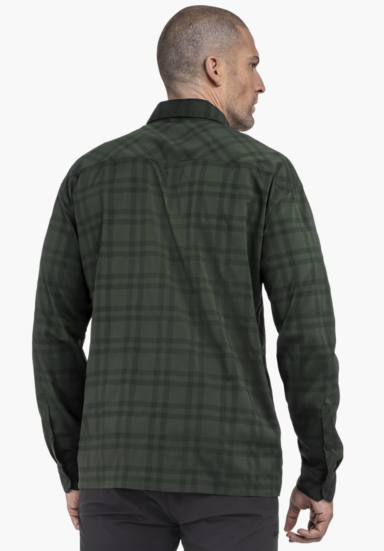 Shirt Style Yekuro MNS dark green checked long-sleeve shirt worn by a man; rear view with head turned right; calm light background.
