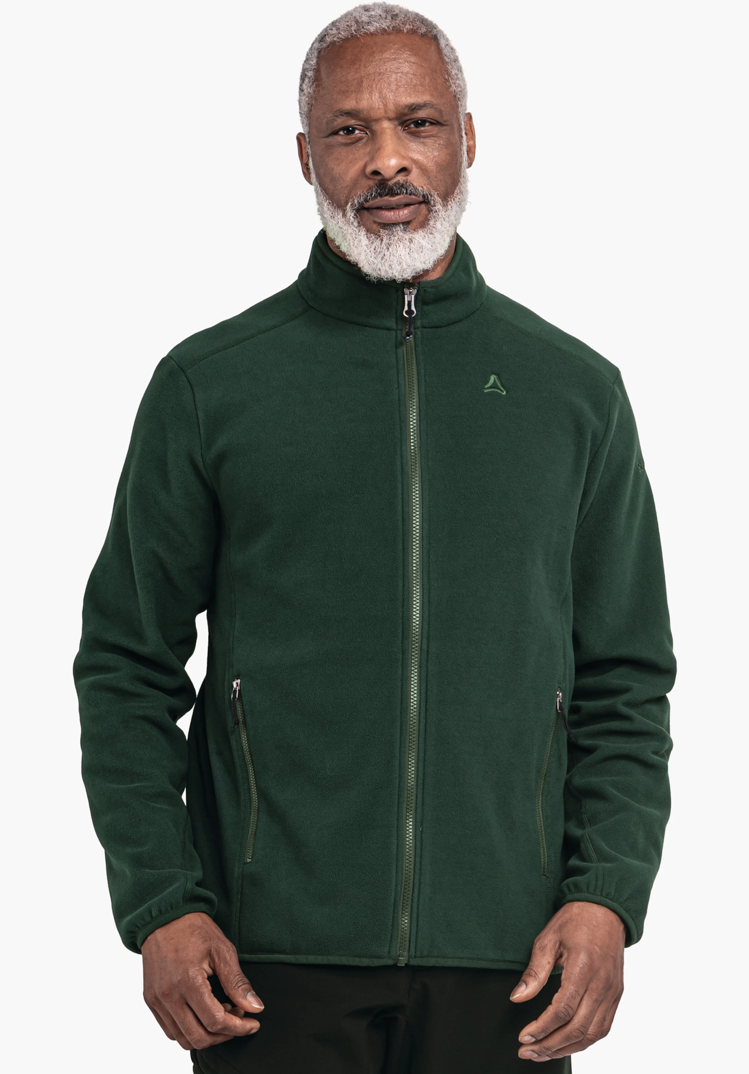 Fleece Jk Style Ash MNS veste polaire vert foncé avec fermeture éclair intégrale et poches zippées, logo Schöffel sur la poitrine; portée par un homme debout devant un fond blanc.