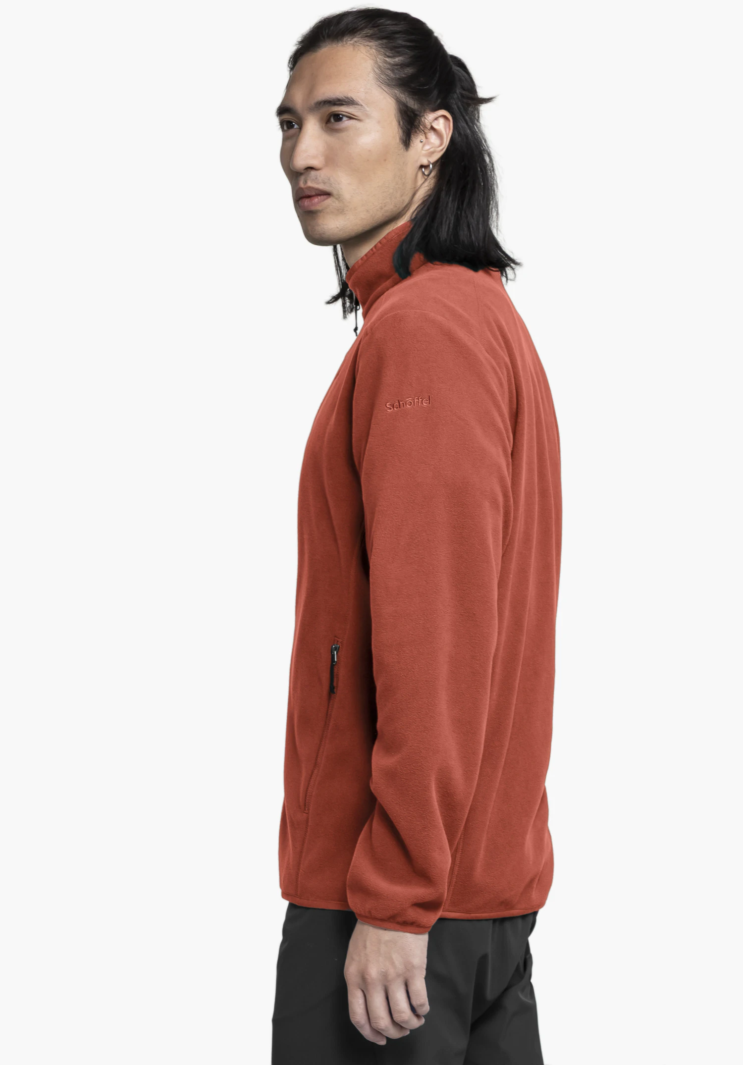 Fleece Jk Style Ash MNS in red, shown in a side profile view against a neutral background, highlighting the subtle Schöffel logo on the upper arm.
