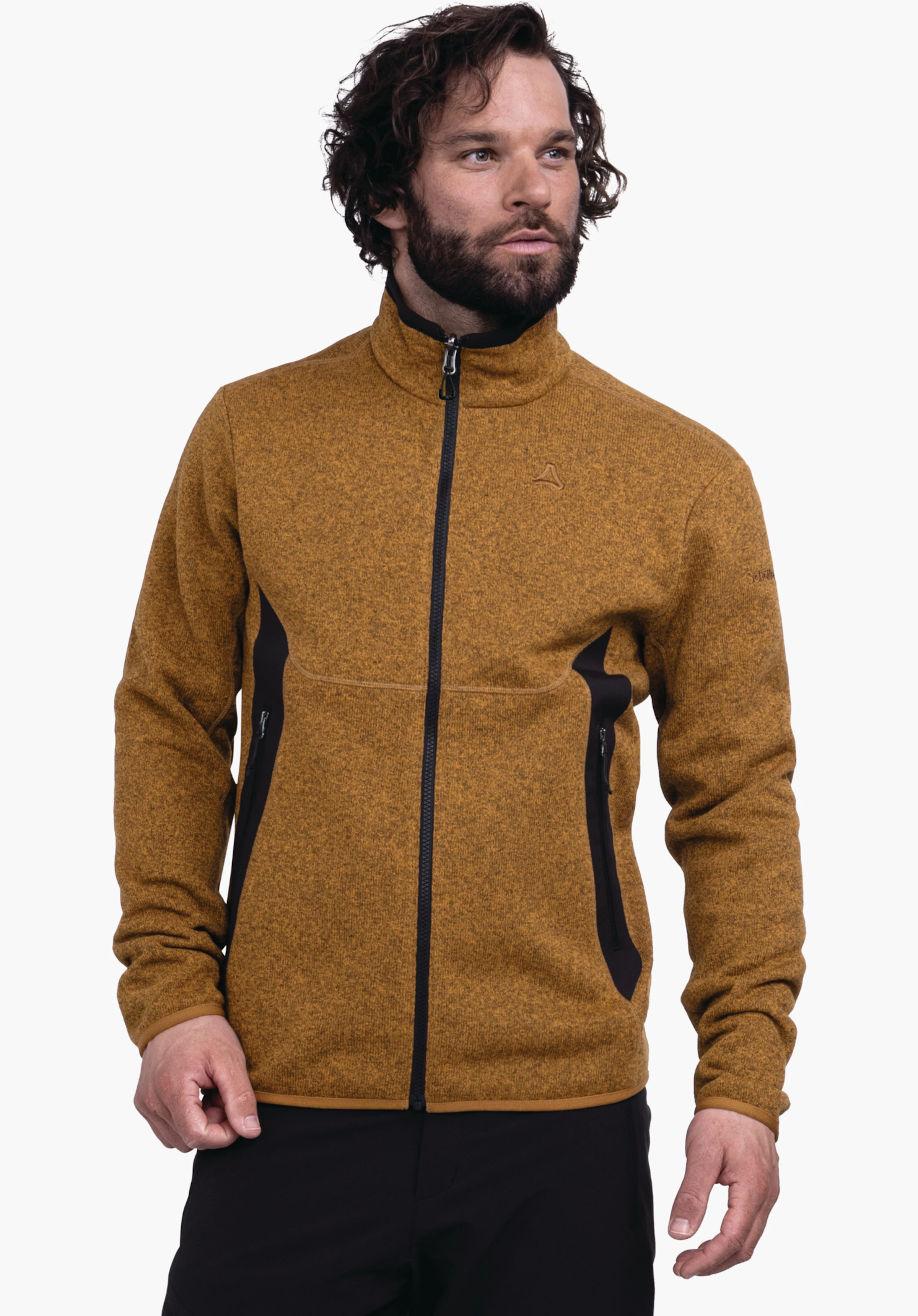 CIRC Fleece Jk Style Yew MNS dunkel gelbe Zip‑Jacke mit Schöffel-Logo auf der Brust, geschlossen getragen von einem Mann; er steht frontal vor weißem Hintergrund, schwarze Reißverschlüsse und Taschenakzente.