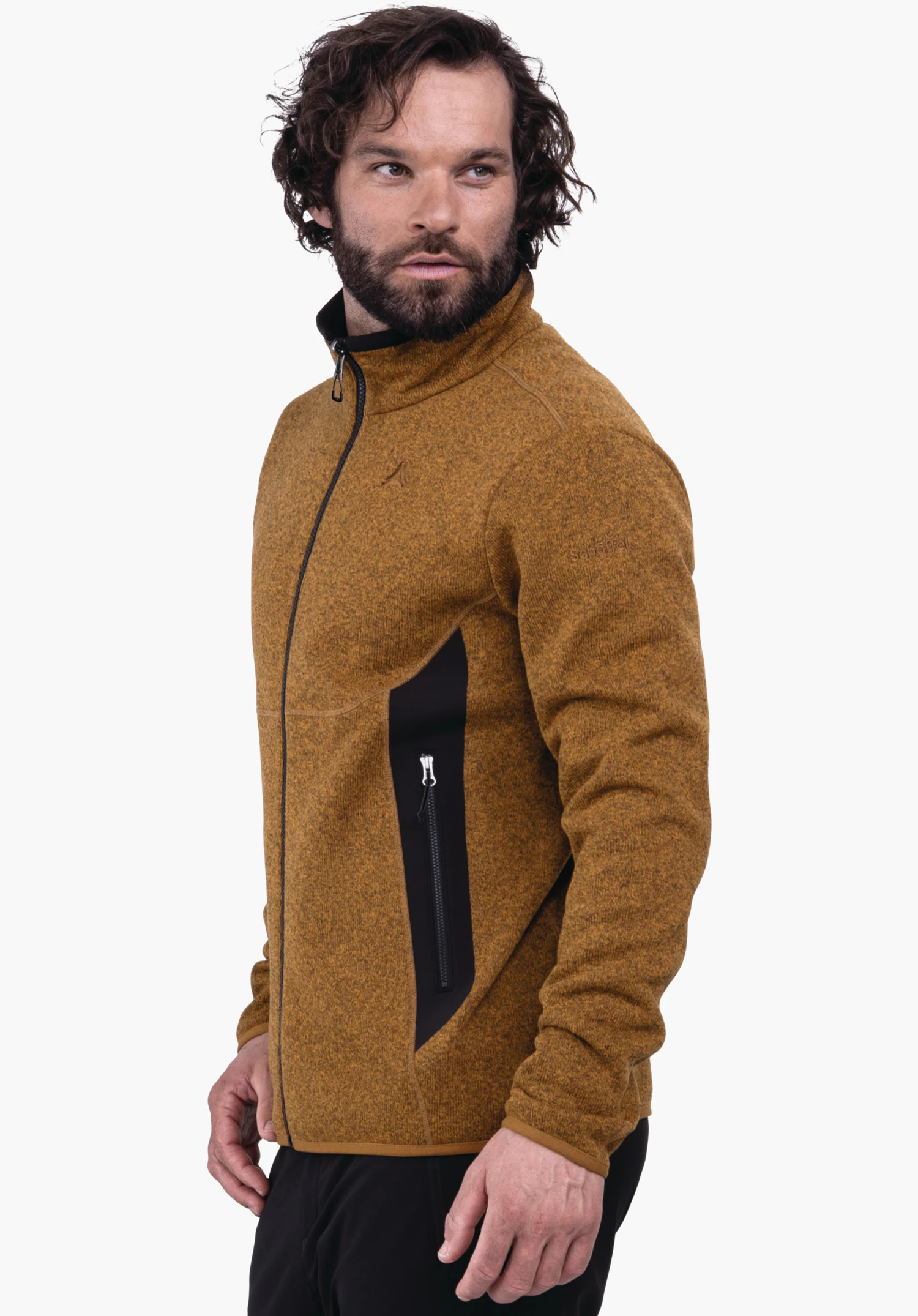 CIRC Fleece Jk Style Yew MNS dark orange jacket with Schöffel logo; worn by a man looking to the right; side black zip pocket visible; white background. Text: Schöffel.