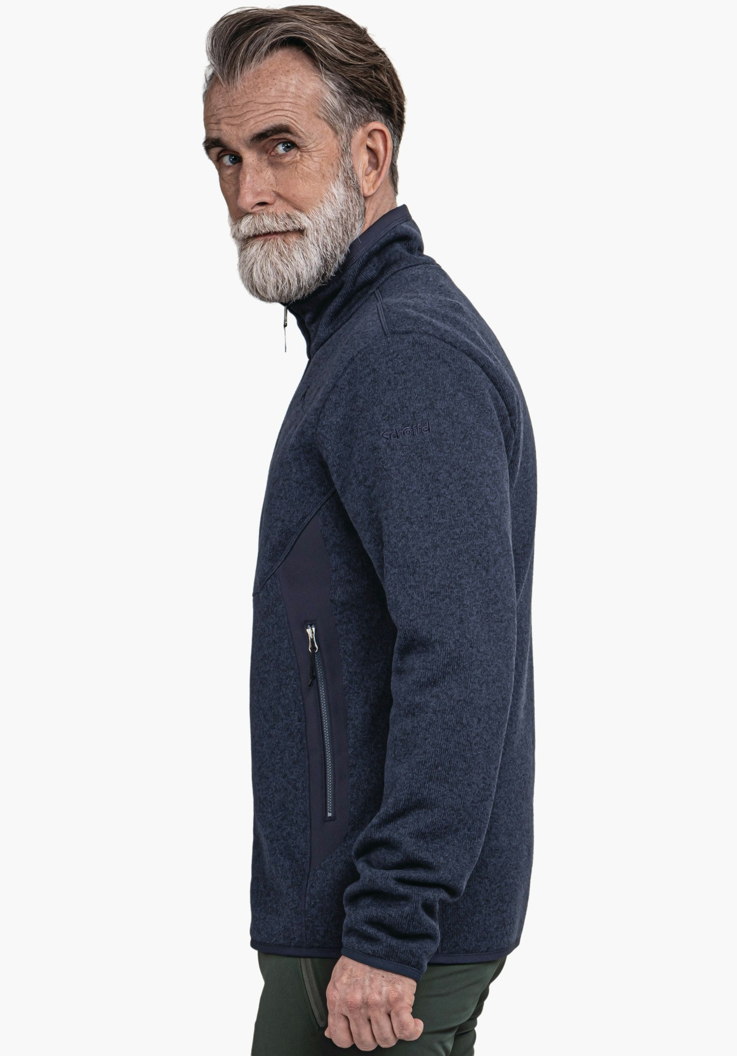 CIRC Fleece Jk Style Yew MNS dark blue jacket worn by a man looking side-on over the shoulder; standing in front of a white background. Text on sleeve: "schöffel".
