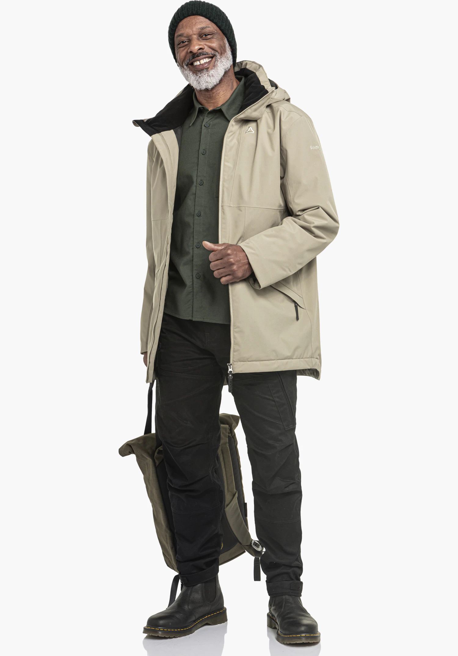 Ins Parka Style Malkay MNS montre le logo Schöffel discret sur la poitrine brune ainsi que la fermeture éclair robuste, gros plan sur fond blanc/neutre.