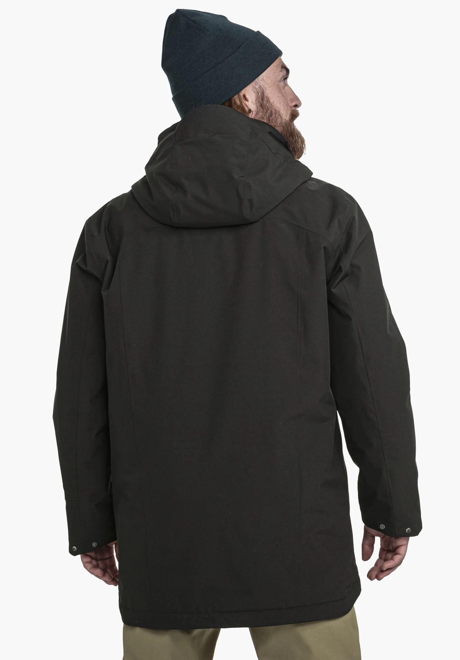 Ins Parka Style Malkay MNS black hooded jacket worn by a man looking to the right; wearing a dark blue hat; neutral white background.