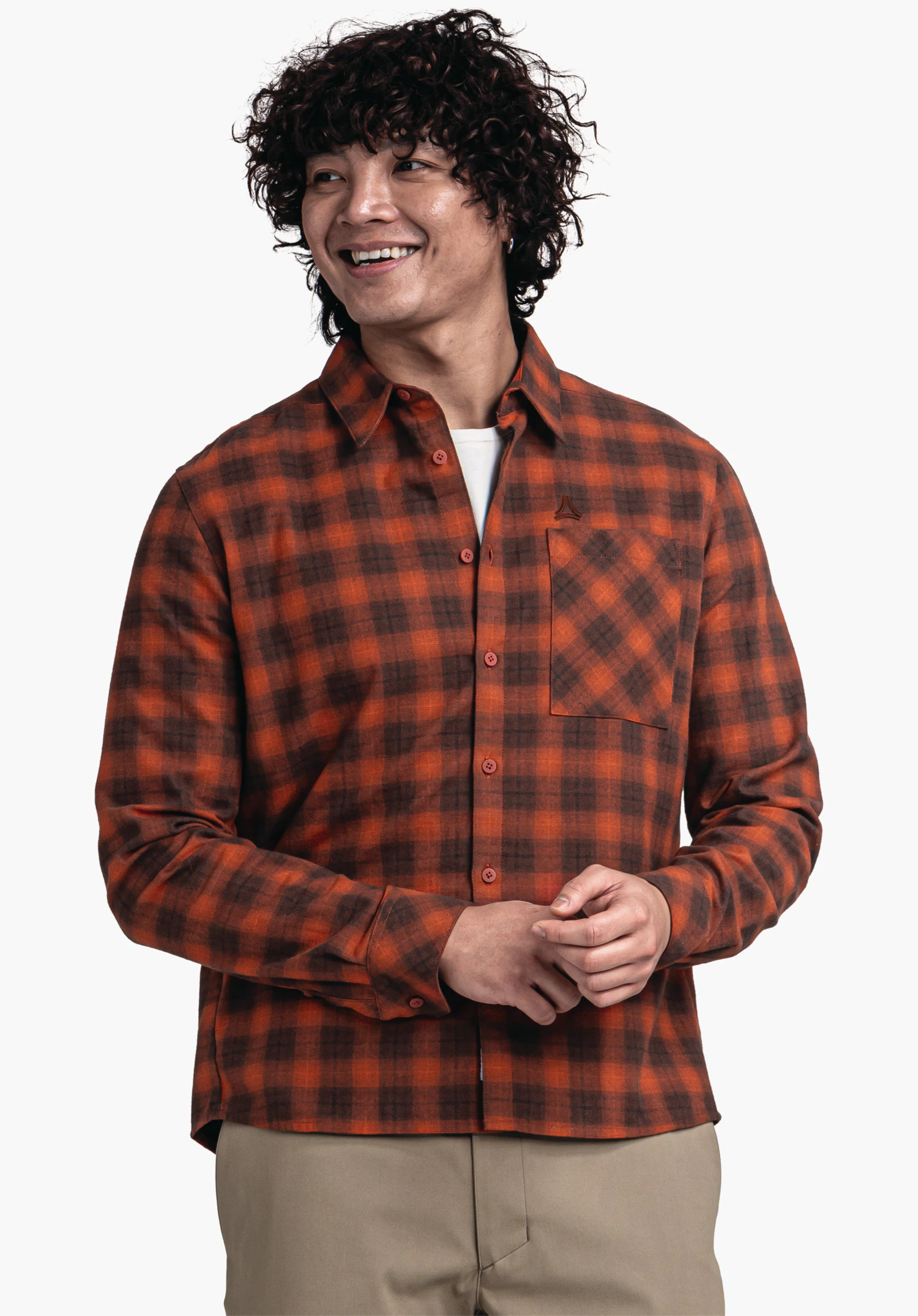 Shirt Style Kleion MNS dark red checked shirt with Schöffel logo on the chest pocket, worn by a smiling man against a white background.