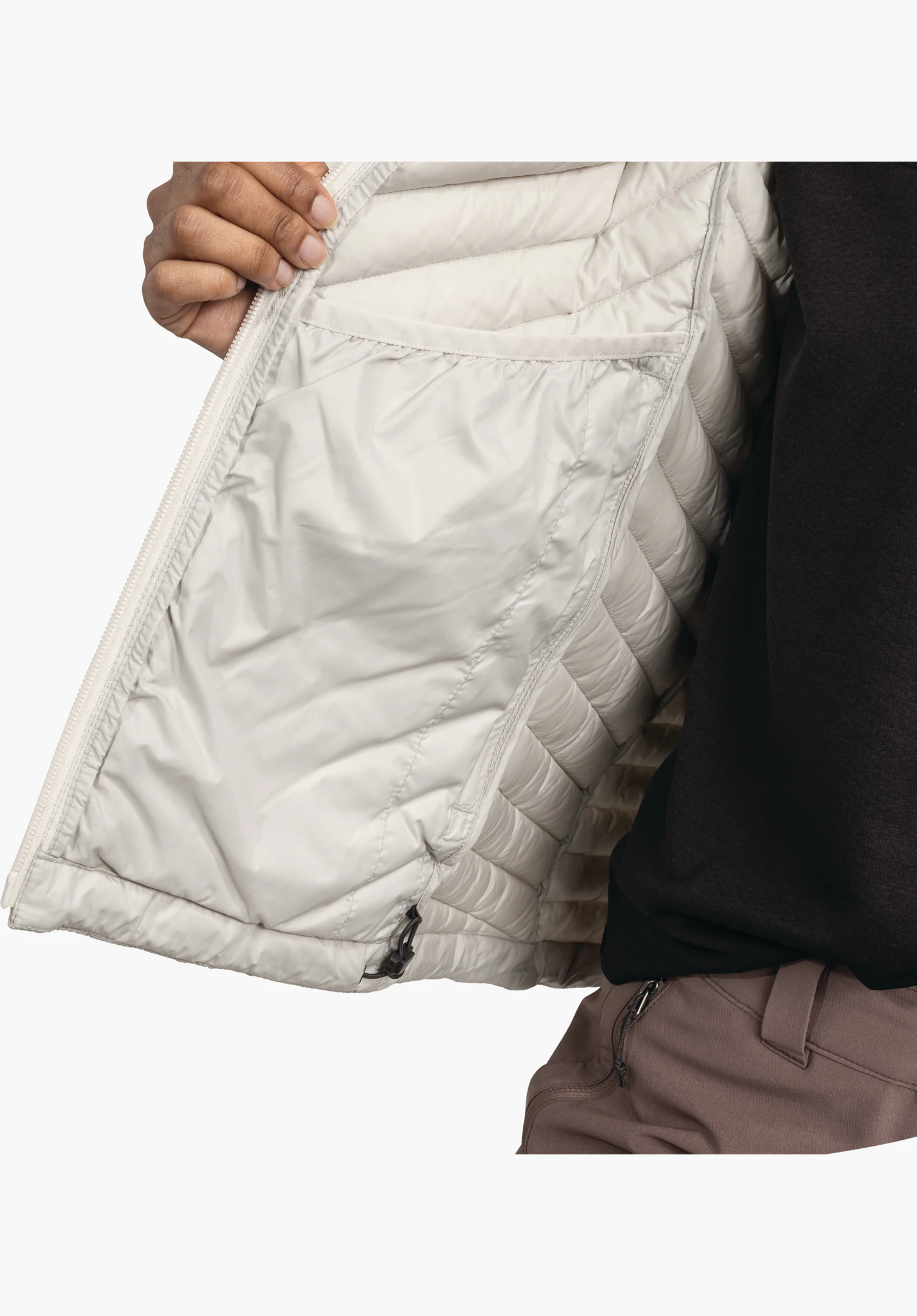 Down Jacket Style Cascata WMS toont de voering in natuur met een grote binnenzak en het verstelbare trekkoord aan de zoom, close-up tegen een witte/neutrale achtergrond.