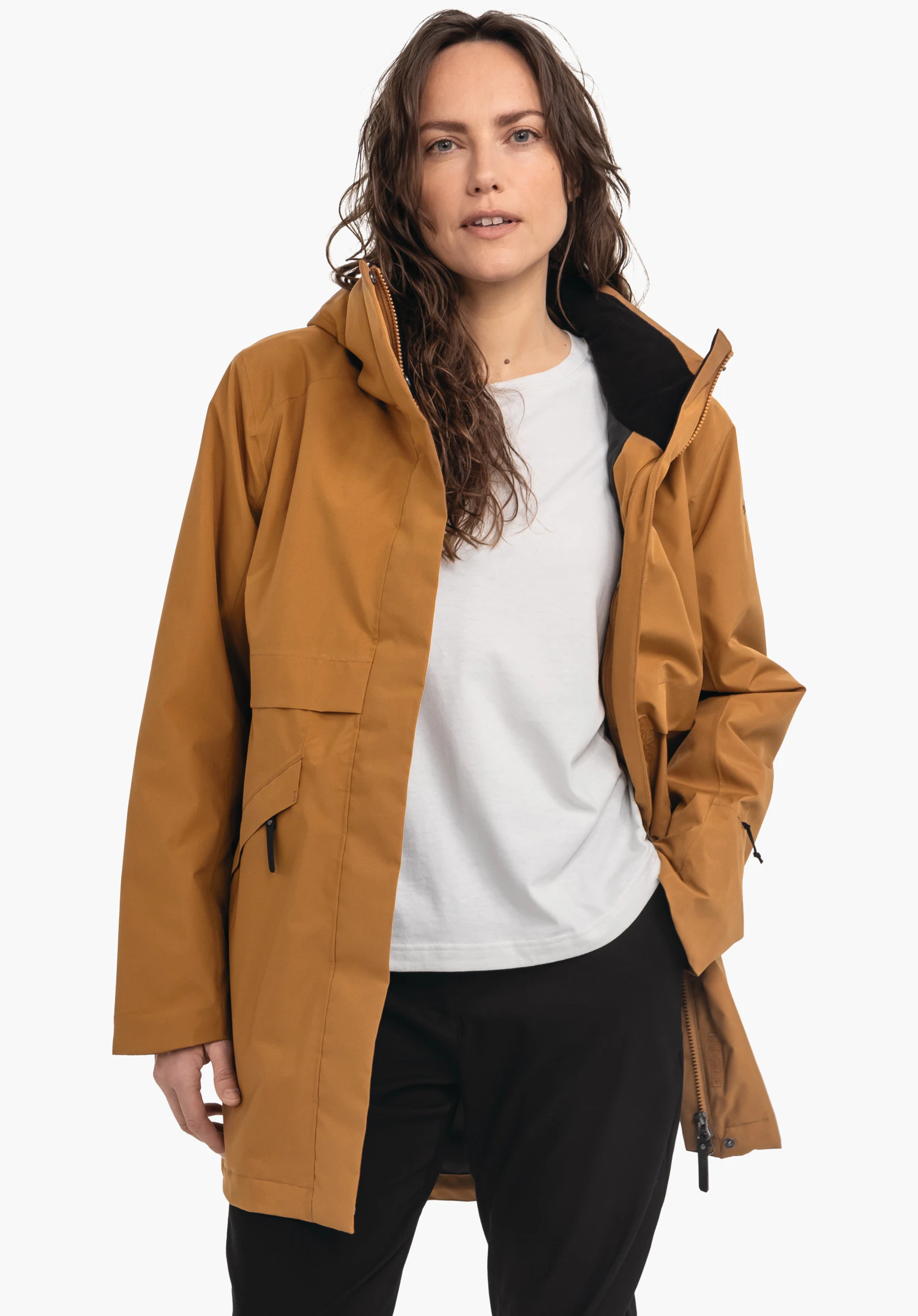 Ins Parka Style Malkay WMS toont de gladde structuur van de bruine stof en de details van de zakklep. Close-up voor een witte/neutrale achtergrond.