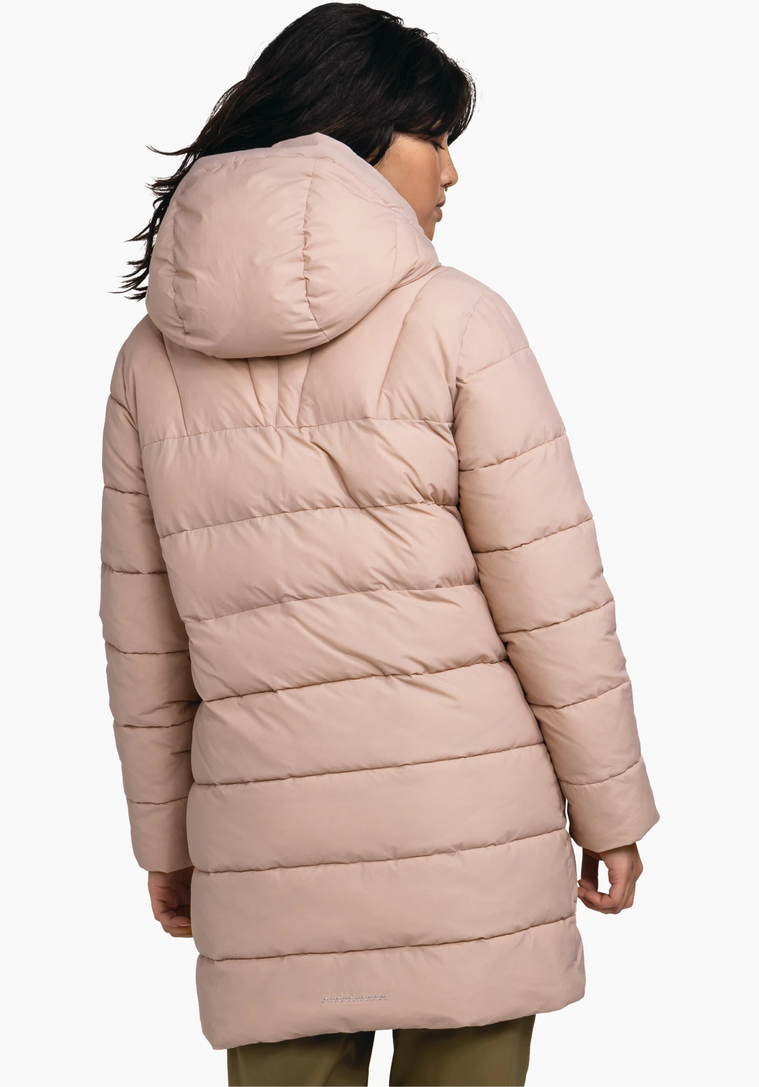 Ins Parka Style Boslix WMS quilted hooded coat worn from the back; quilted, hip-length; model stands slightly turned sideways against a neutral light background.