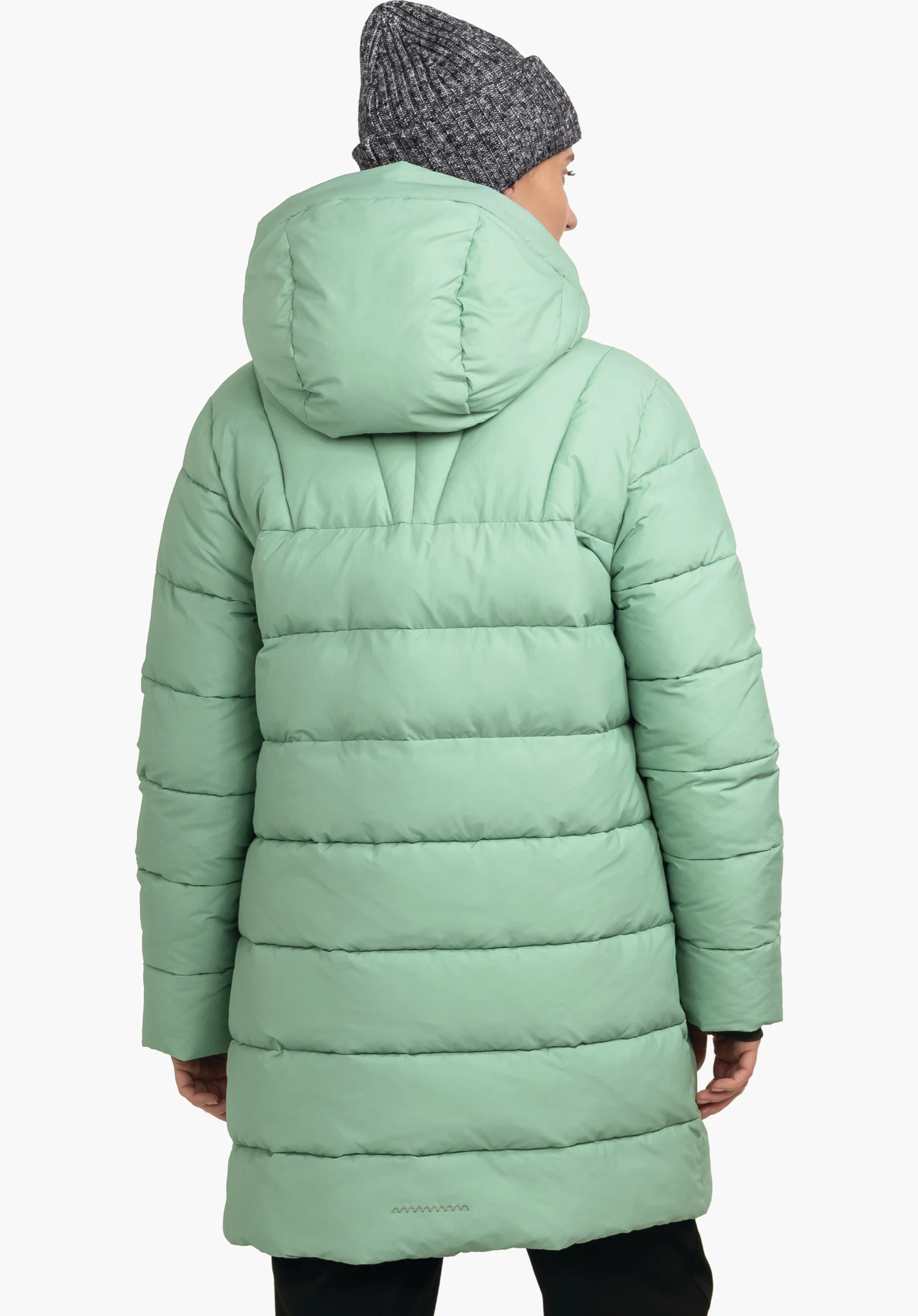 Ins Parka Style Boslix WMS manteau matelassé vert clair avec capuche, porté de dos; devant un fond blanc, bonnet en maille sur la tête et mains visibles sur les côtés.
