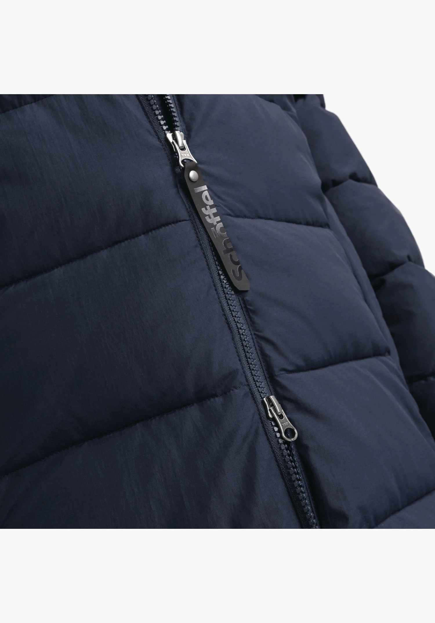 Ins Parka Style Boslix WMS toont de 2-wegrits met Schöffel-opschrift op de trekker en de blauwe gewatteerde structuur in een close-up tegen een witte/neutrale achtergrond.
