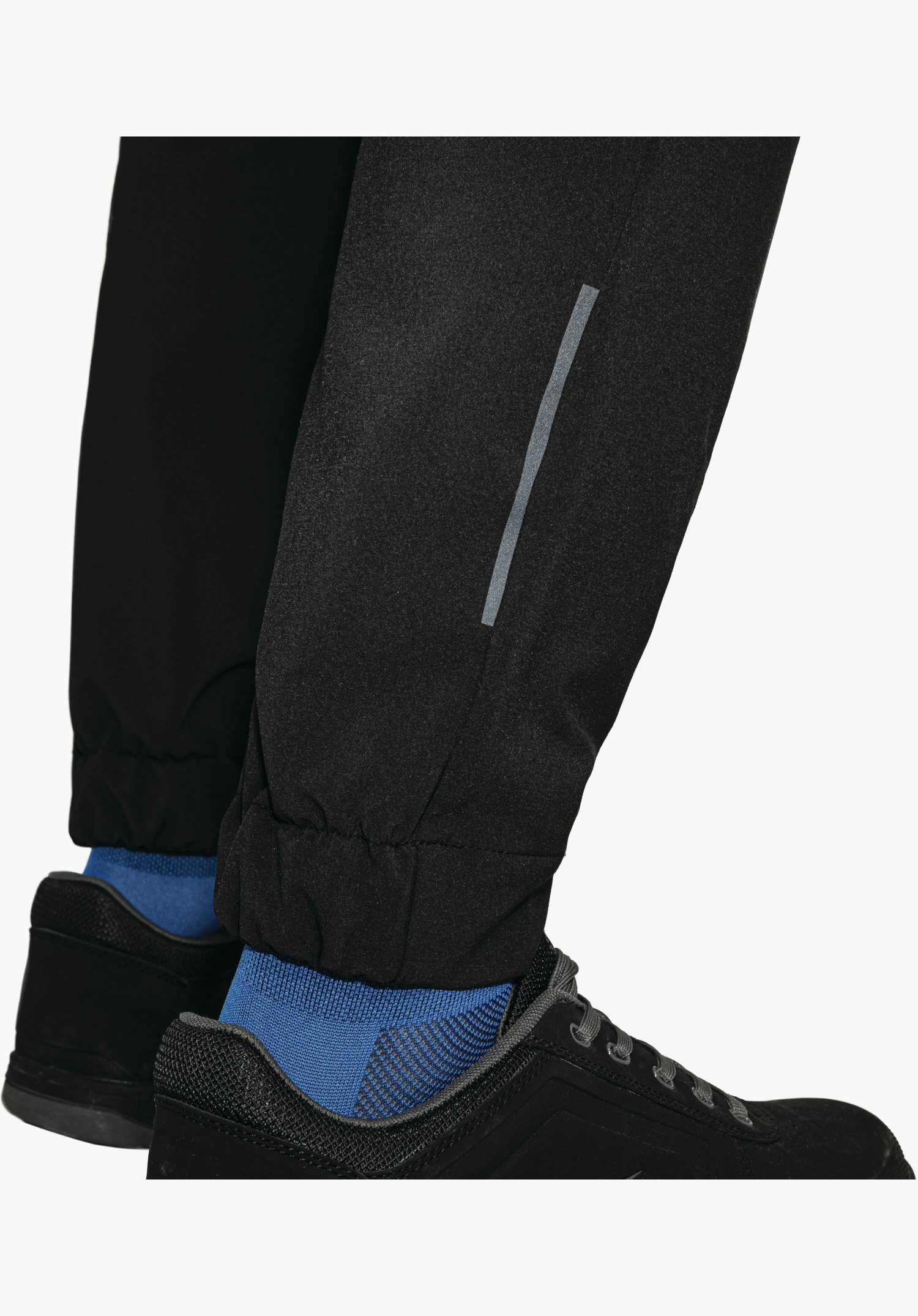 Pants Style Kubena MNS shows the elasticated cuffs at the ankle and a reflective strip on the black fabric. Close-up against a white/neutral background.
