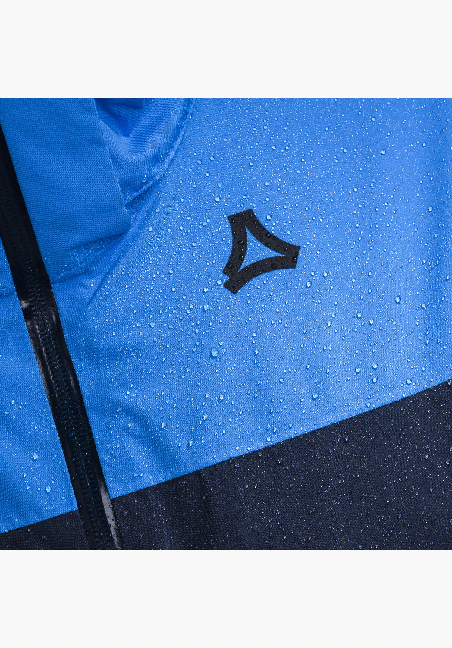Jacket Style Zandwel MNS showing the black Schöffel logo on blue water-repellent material with water droplets close-up against a white or neutral background.