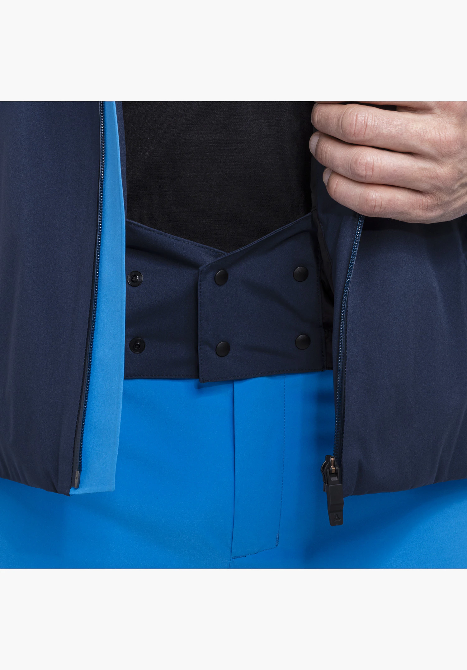 Jacket Style Zandwel MNS with a focus on the blue snow skirt in the inner waist area and snap buttons close-up shot against a white/neutral background.