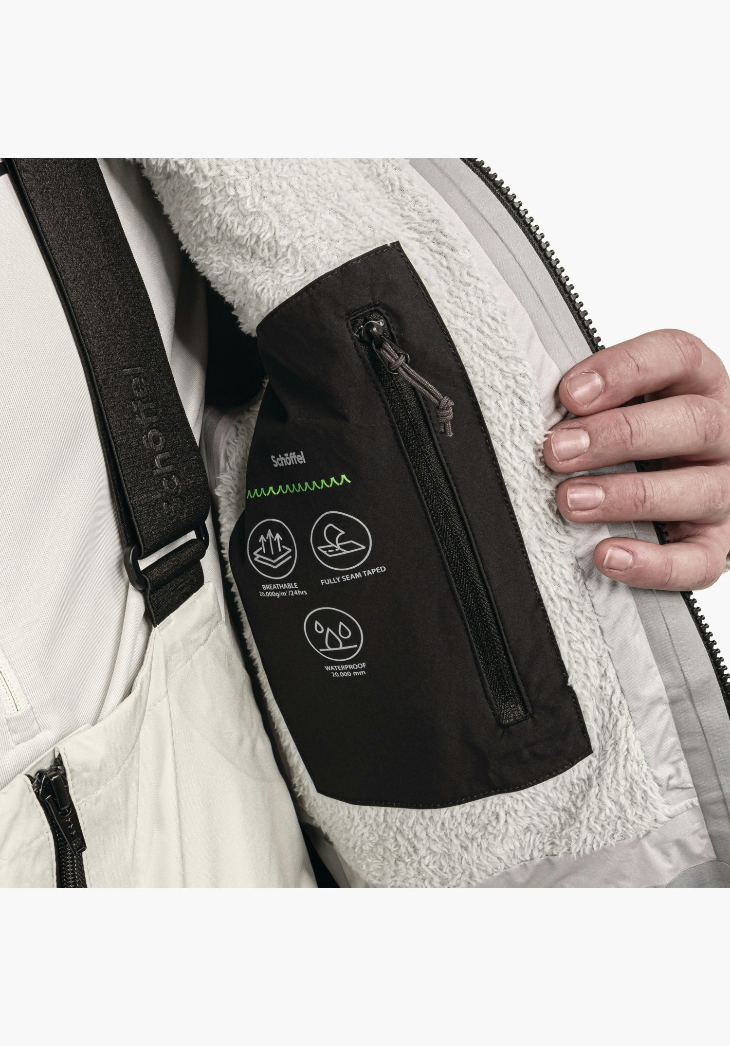 Shell Jk Style Lufeld MNS shows the fluffy teddy lining in nature and the black zipped inner pocket with function icons as well as Schöffel lettering, close-up shot against a white/neutral background.