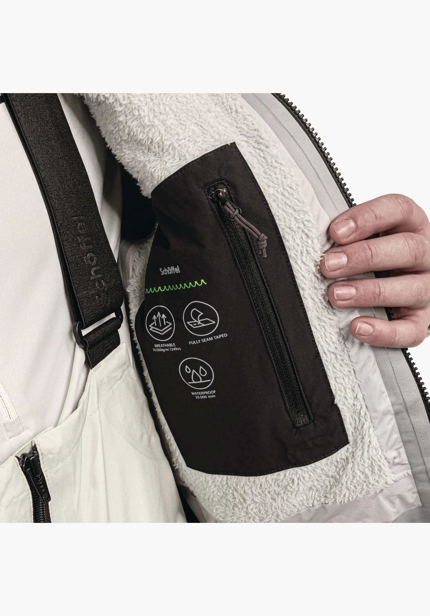 Shell Jk Style Lufeld MNS shows the fluffy teddy lining in nature and the black zipped inner pocket with function icons as well as Schöffel lettering, close-up shot against a white/neutral background.